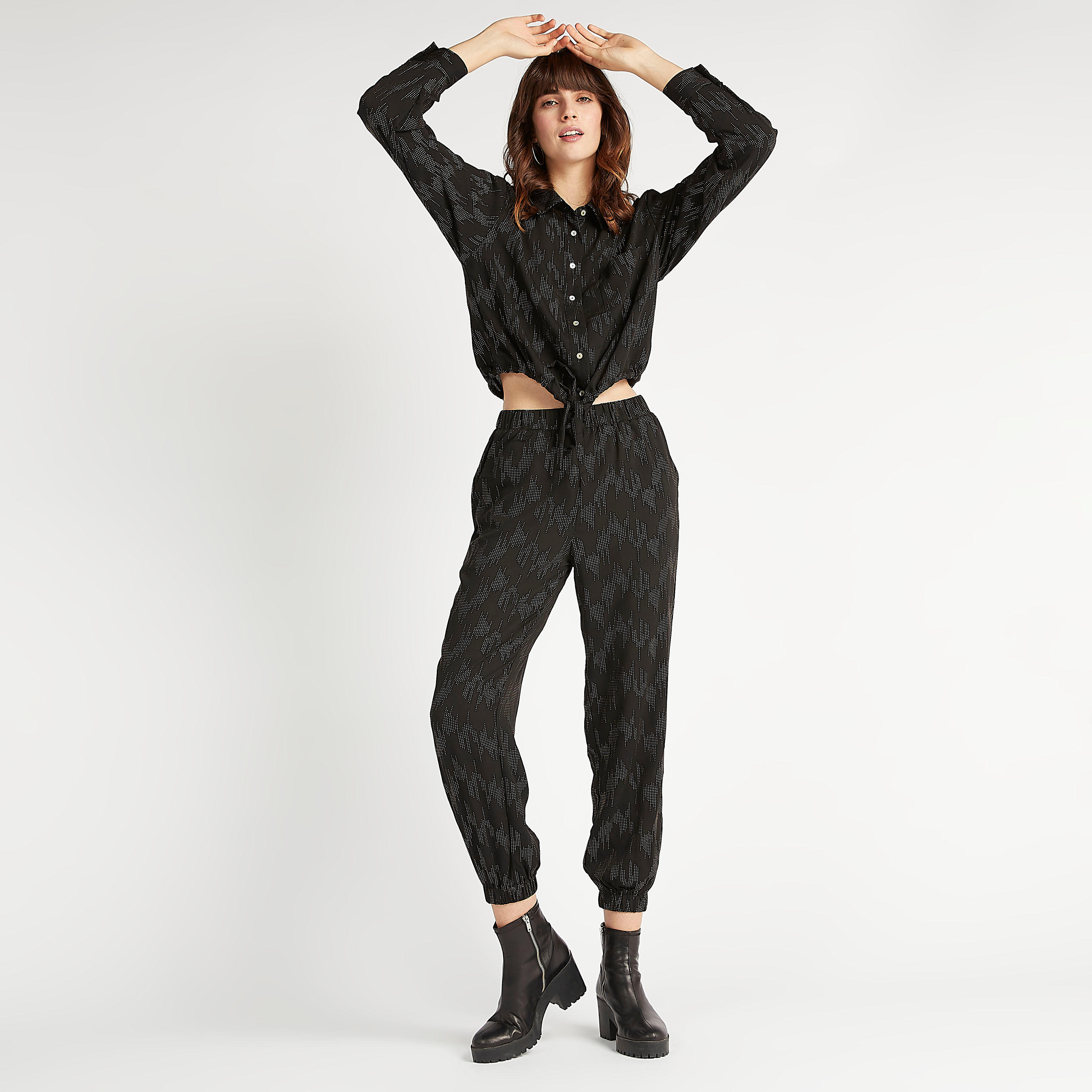 بنطلون رياضي بخصر مطّاطي متوسّط الارتفاع من تو إكستريمز-women-clothing-bottoms-joggers-image-1