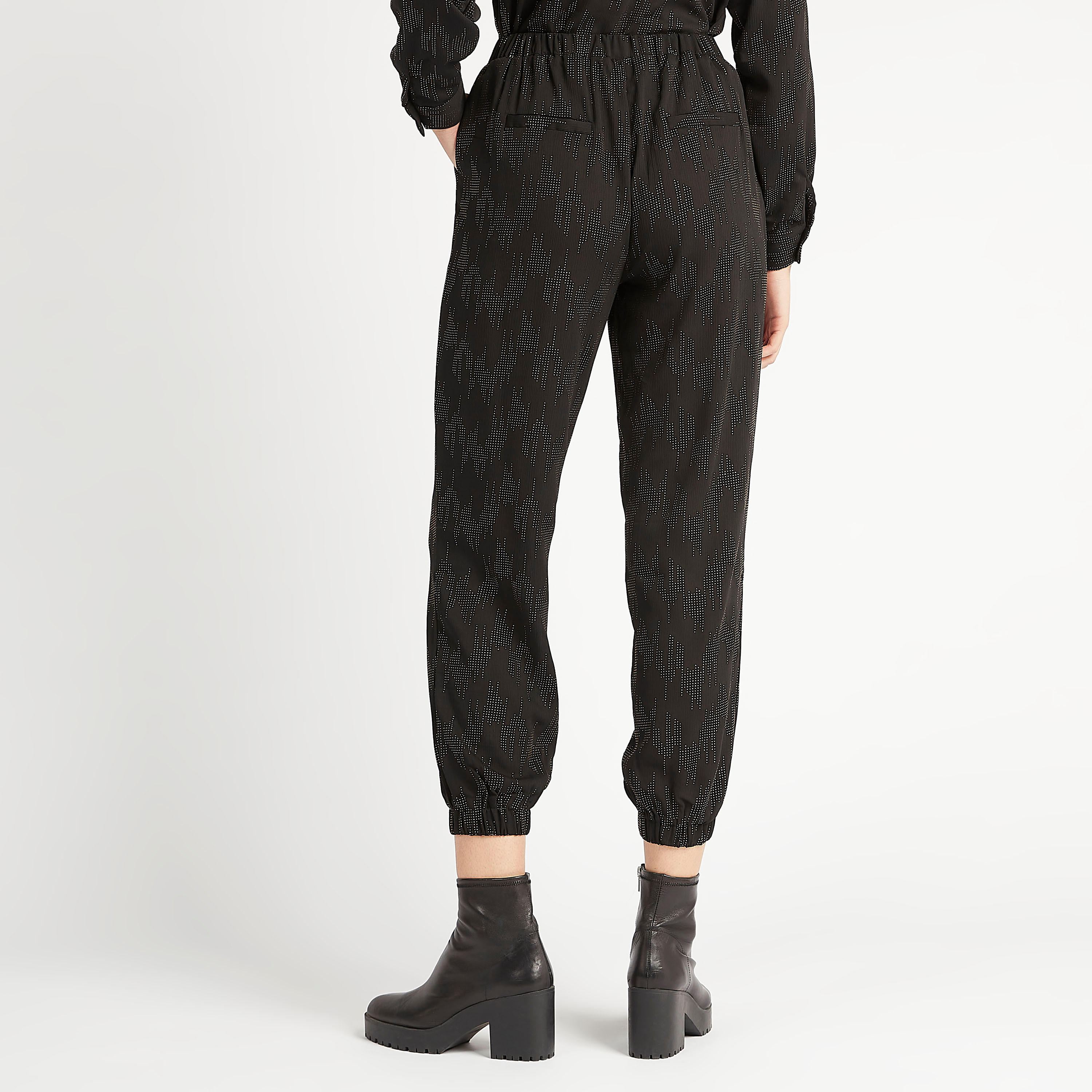 بنطلون رياضي بخصر مطّاطي متوسّط الارتفاع من تو إكستريمز-women-clothing-bottoms-joggers-image-4