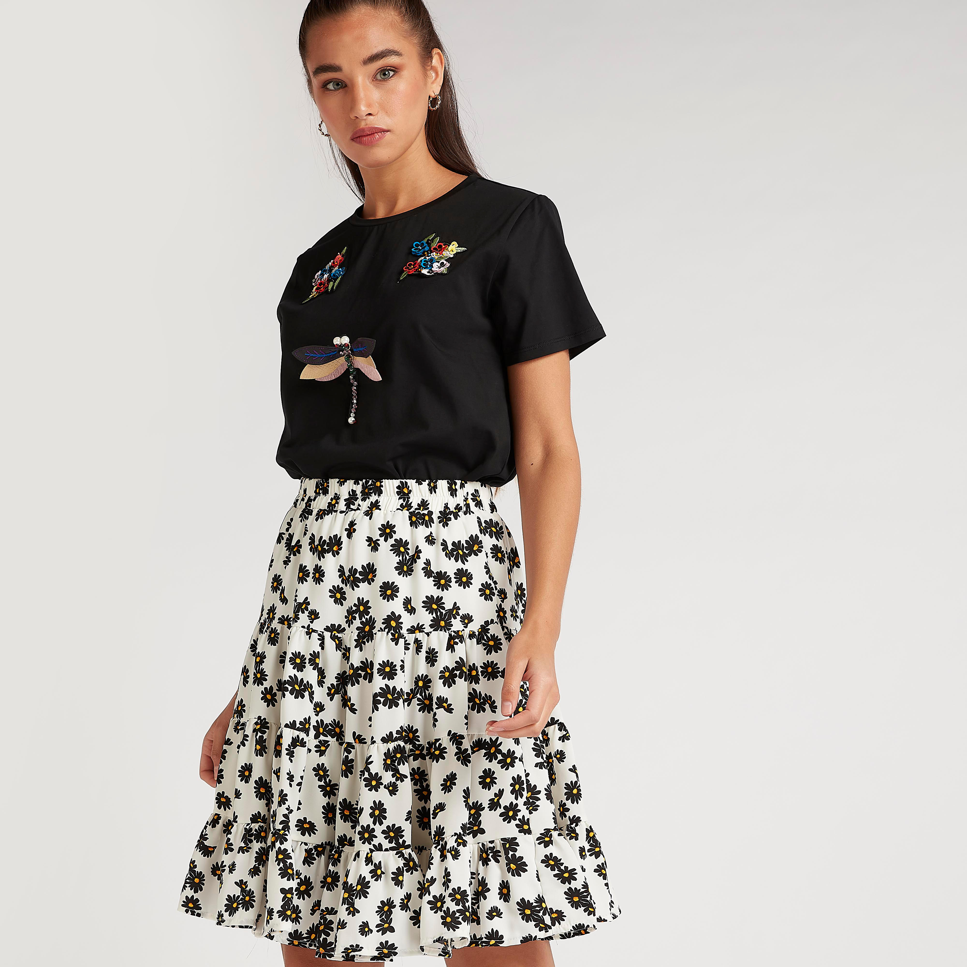 تنّورة منسدلة واسعة قصيرة بطبعات أزهار وخصر مطّاطي من تو إكستريمز-women-clothing-bottoms-skirts-image-1