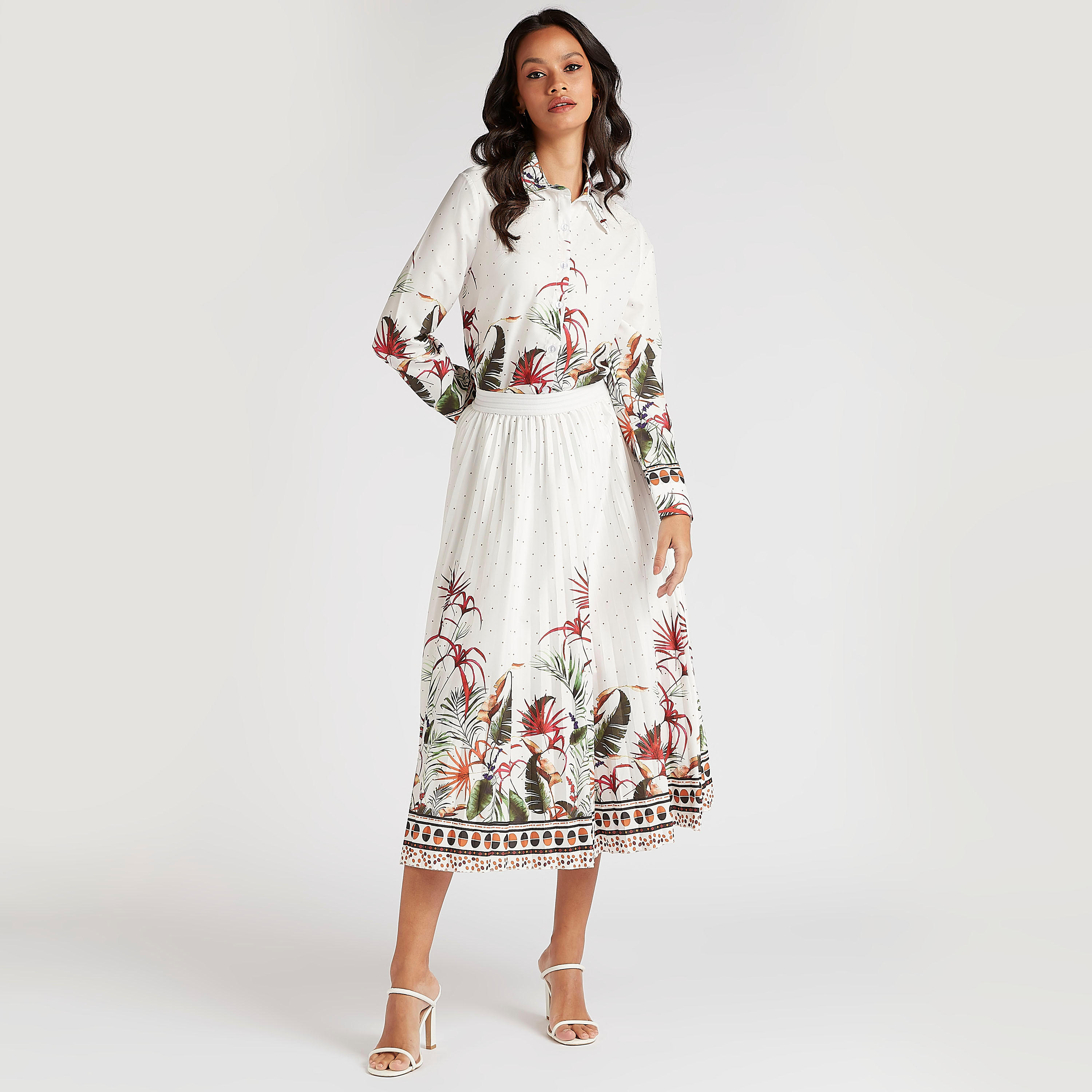 تنورة رسميّة ميدي إيه لاين بطبعات من تو إكستريمز-women-clothing-bottoms-skirts-image-2