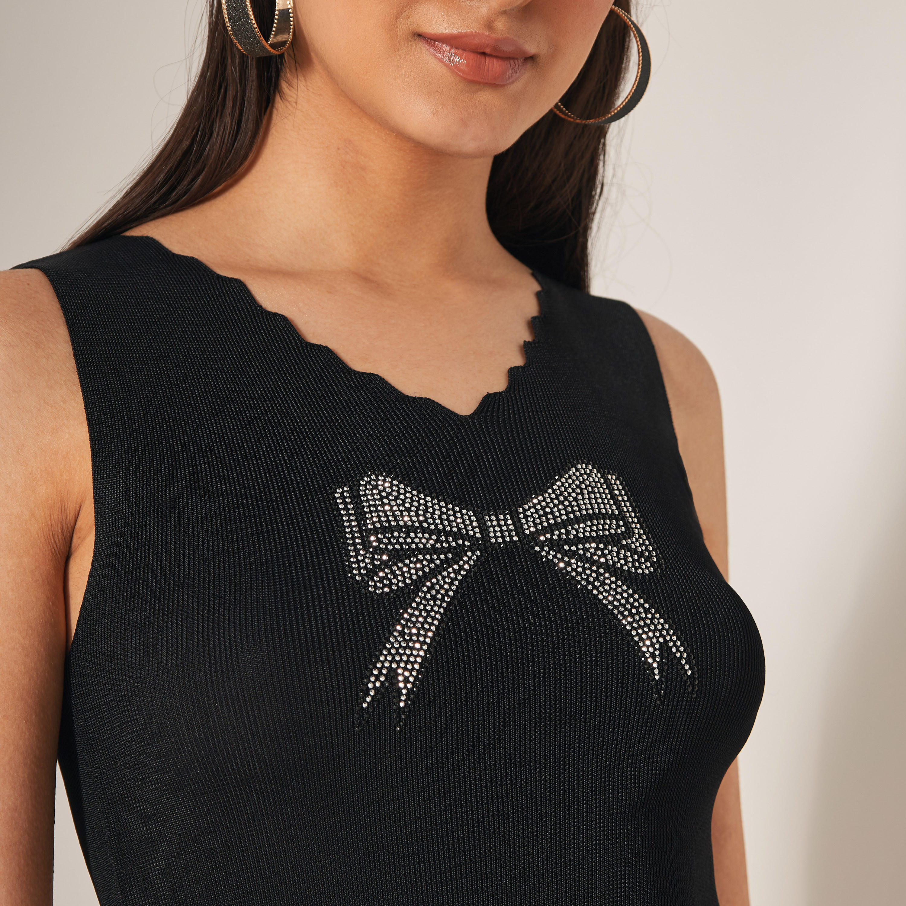بلوزة دون أكمام مزيّنة من تو إكستريمز-women-clothing-tshirts-image-4