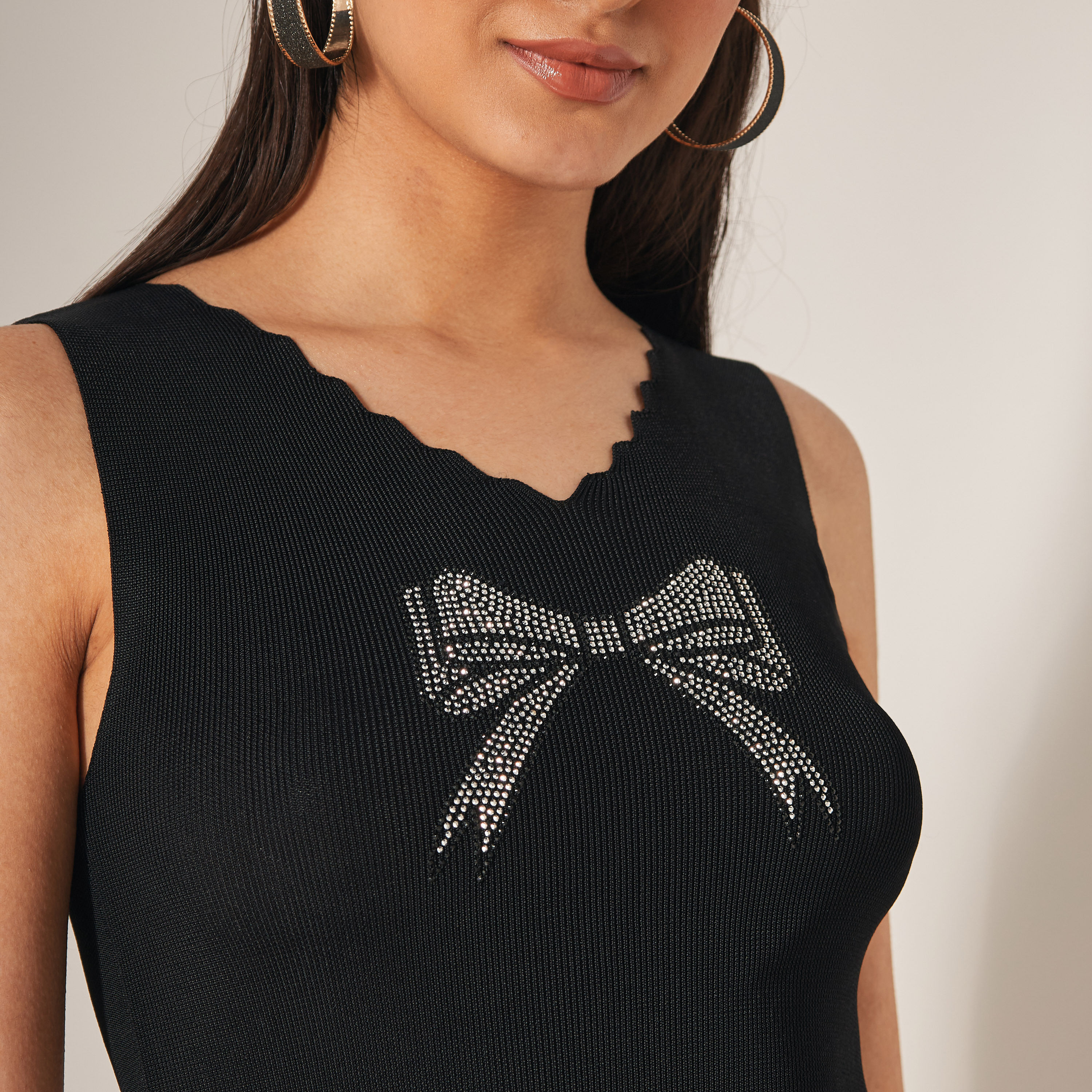 بلوزة دون أكمام مزيّنة من تو إكستريمز-women-clothing-tshirts-image-4