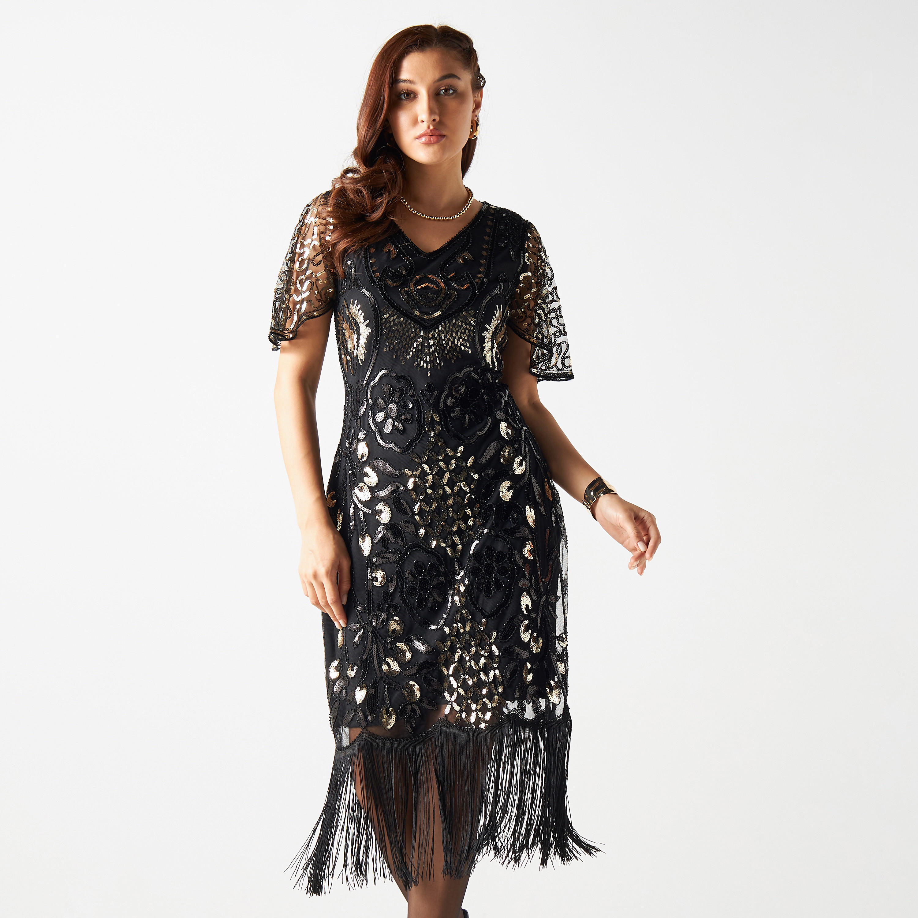فستان بقصة ضيّقة وتزيينات ترتر وياقة v وشراشيب من تو إكستريمز-women-clothing-dresses-image-1