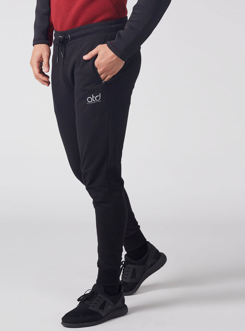بنطال رياضي طويل بخصر مطّاطي وجيوب-men-clothing-sportswearandactivewear-bottoms-image-4