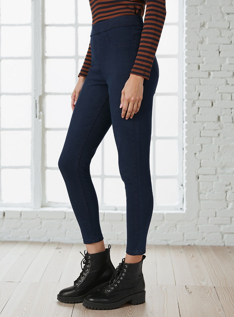 بنطلون جينز ضيّق سادة بخصر مطّاطي وجيوب من لي كوبر-women-clothing-bottoms-leggings-image-4