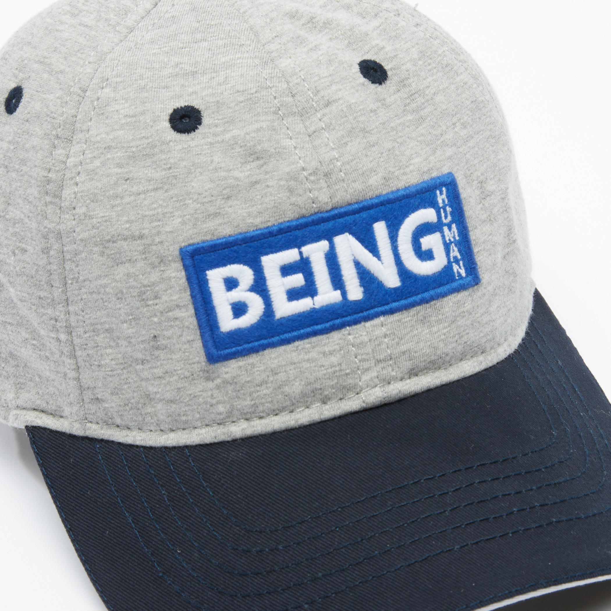 قبعة كاب مطرّزة بثنية إغلاق من بيينج هيومان-men-caps-image-4