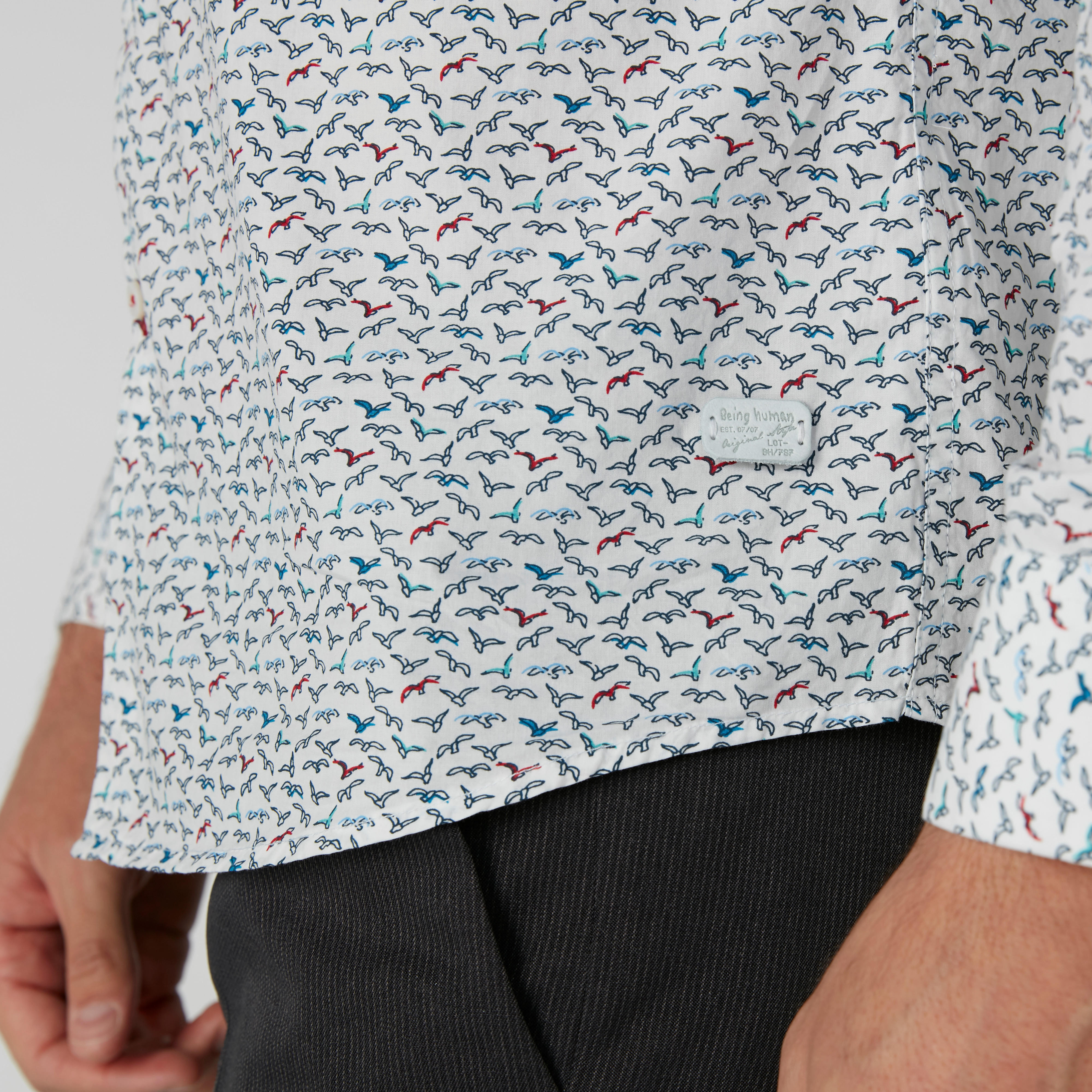 قميص مستدام سليم فيت بأكمام طويلة وطبعات بيينج هيومان-men-clothing-shirts-image-5