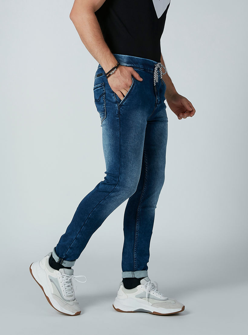 بنطلون جينز مستدام برباط وخصر منخفض من بيينج هيومان-men-clothing-bottoms-jeans-image-3