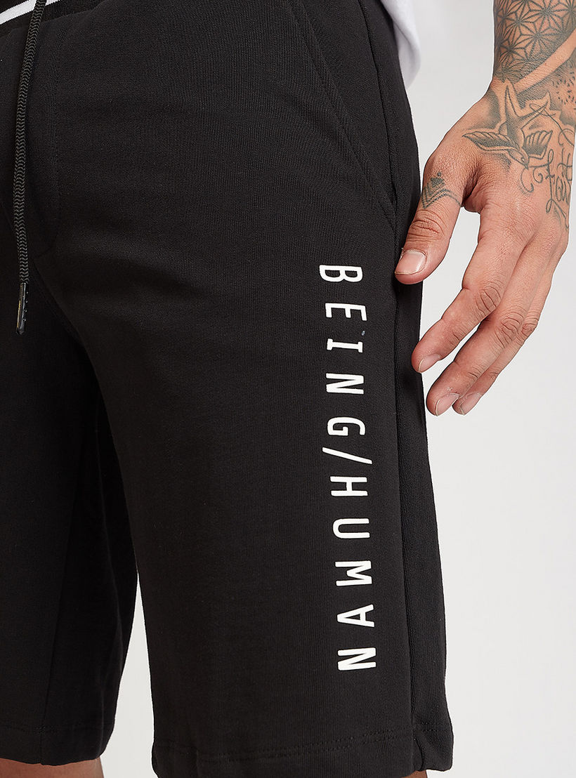 شورت بارز الملمس بخصر مطّاطي متوسط بيينج هيومان-men-clothing-bottoms-shorts-image-3