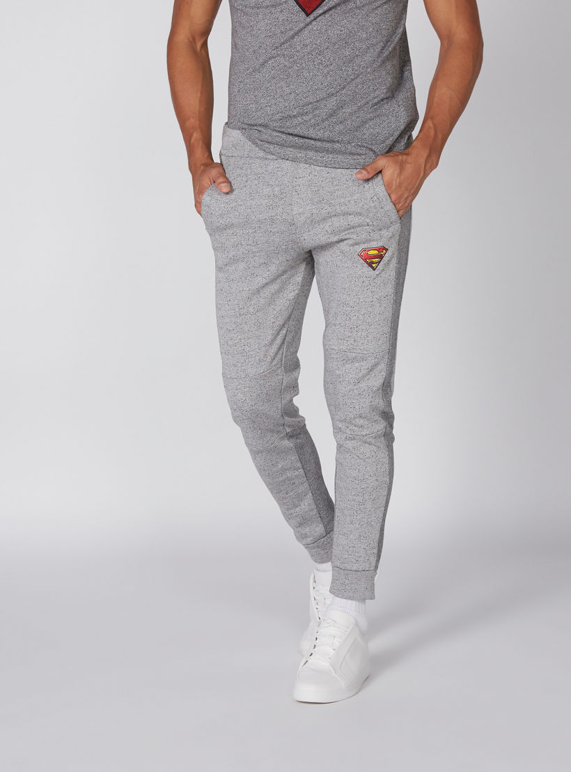 بنطال رياضي طويل بجيوب ونقش سوبرمان-men-clothing-bottoms-joggers-image-1