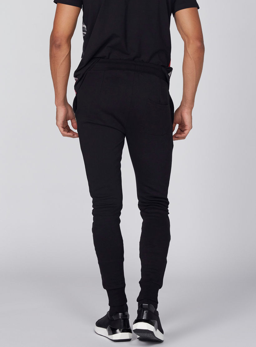 بنطال طويل بأساور مطاطية وجيوب وطبعات باتمان-men-clothing-bottoms-joggers-image-5
