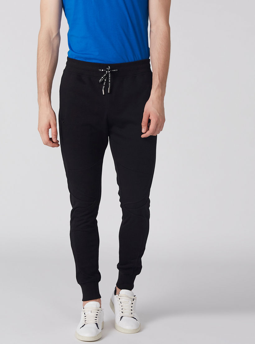 بنطال رياضي طويل بخصر مطاطي برباط-men-clothing-bottoms-joggers-image-1