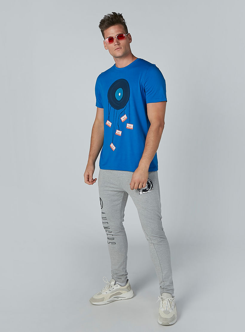 بنطلون رياضي مستدام بقصّة سليم وخصر متوسط الارتفاع وجيوب وطبعات-men-clothing-bottoms-trousersandchinos-trousers-image-2
