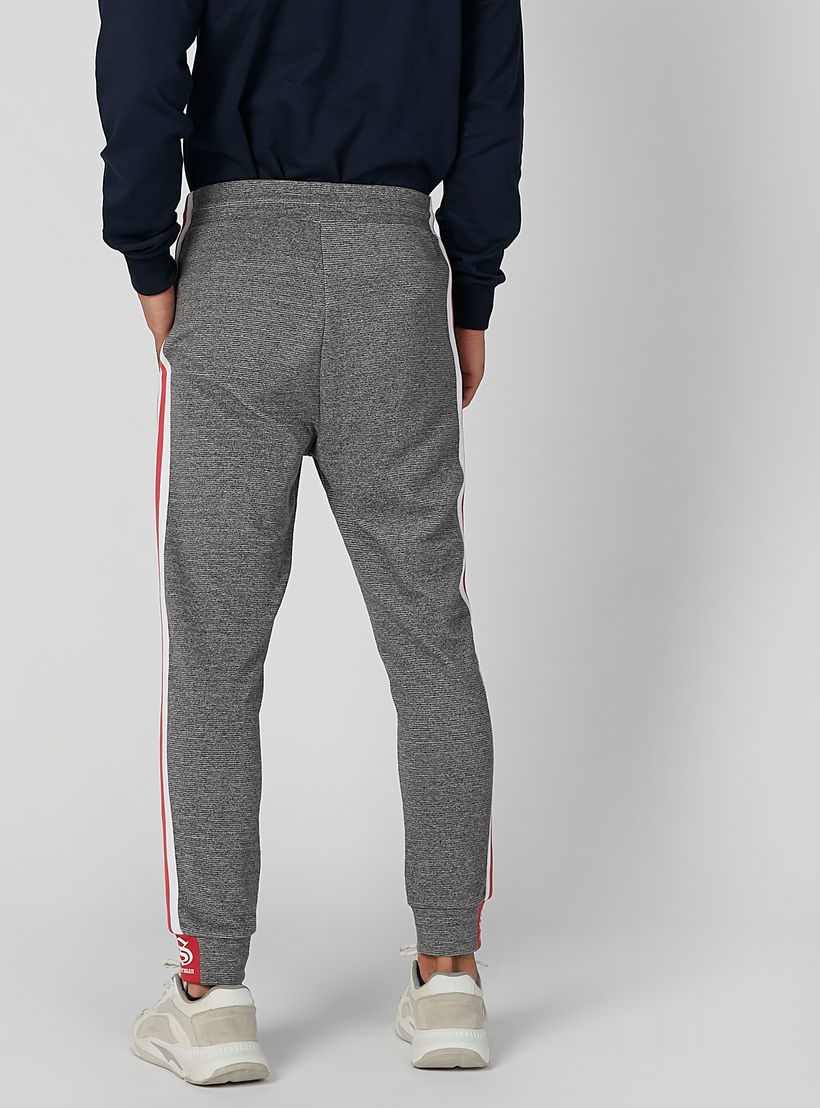 بنطلون مستدام رياضي سليم بخصر متوسط الارتفاع وطبعات سوبرمان -men-clothing-bottoms-joggers-image-4
