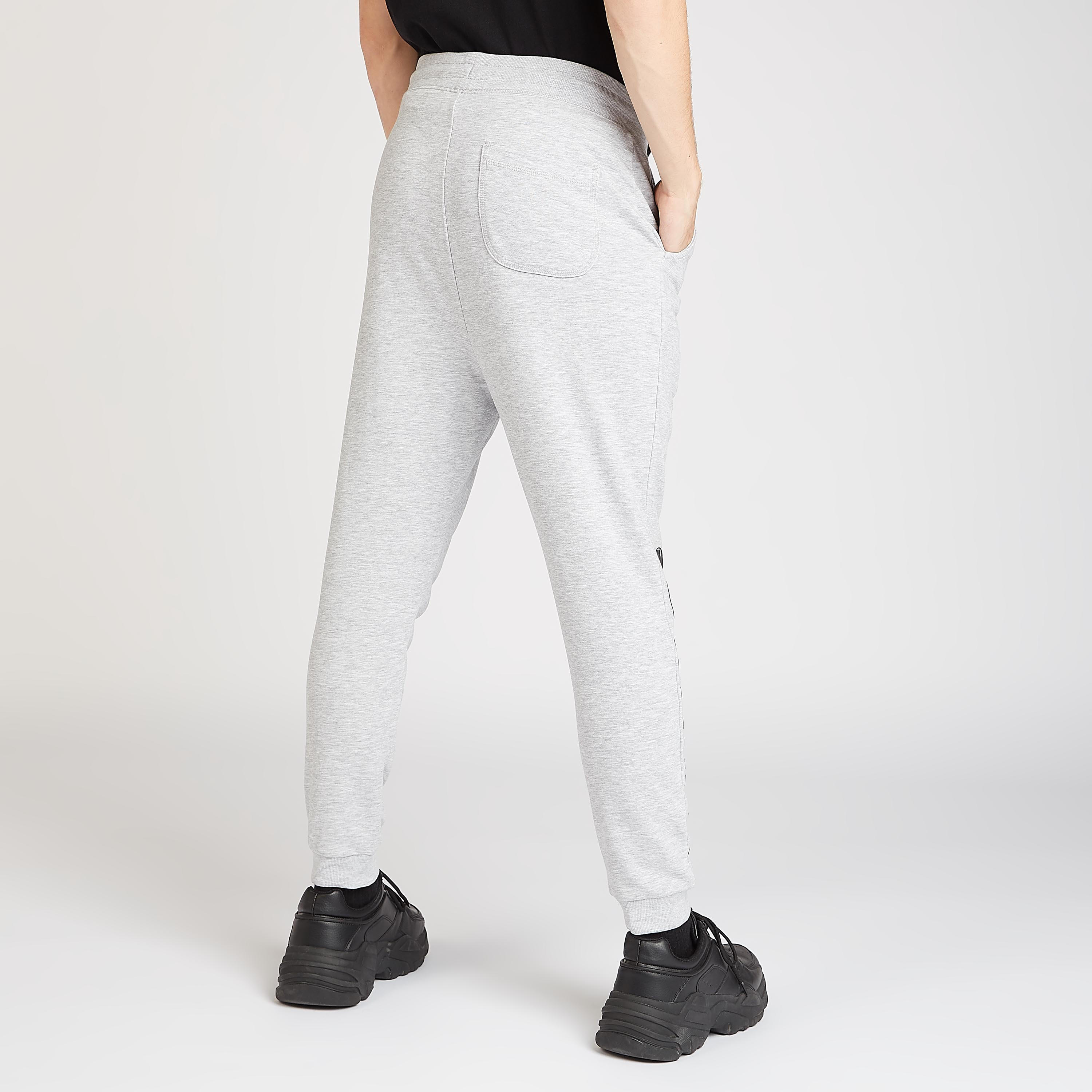 بنطلون رياضي مستدام بجيوب ورباط وطبعات باتمان-men-clothing-bottoms-joggers-image-4