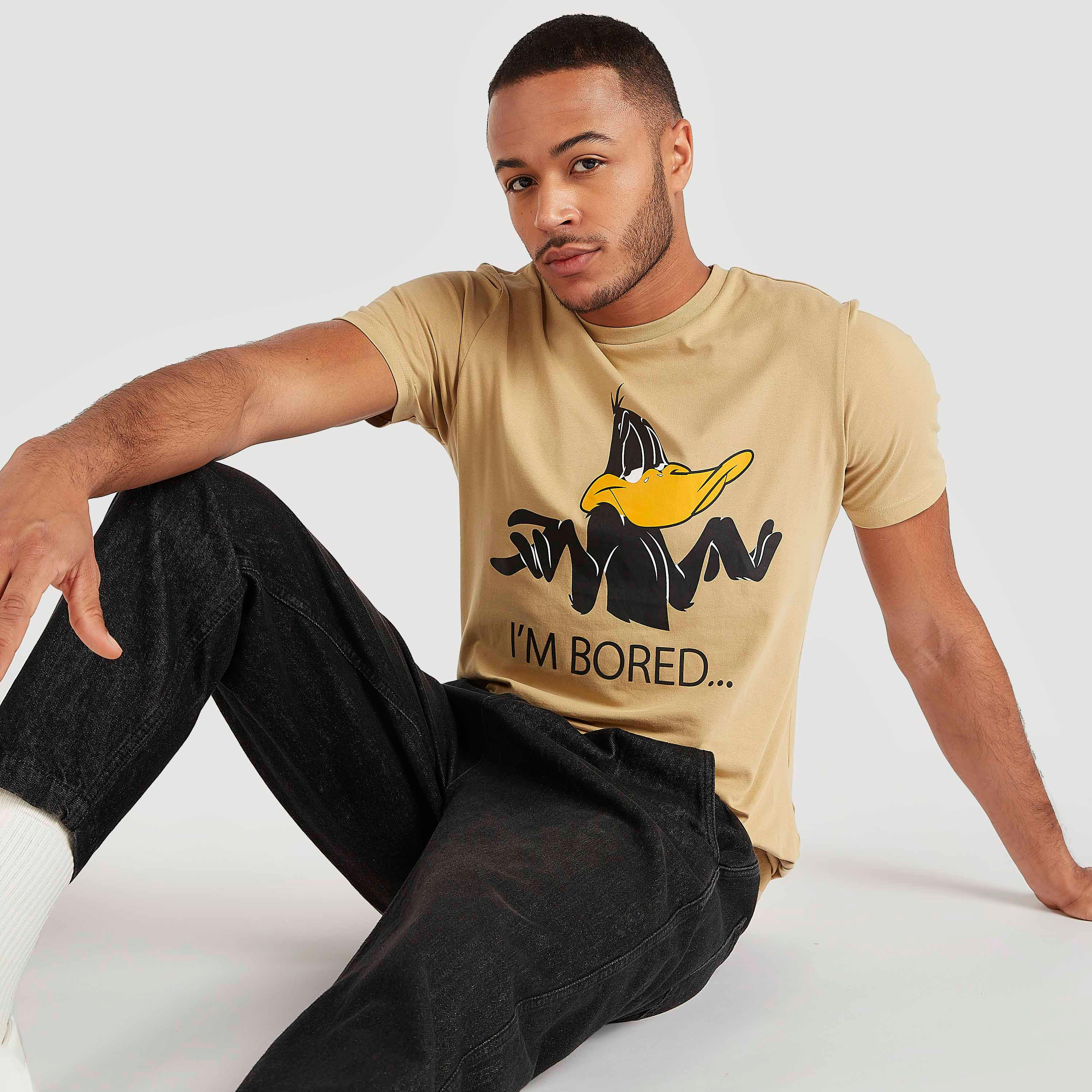 تيشيرت بقصّة مريحة وياقة ضيّقة وأكمام قصيرة وطبعات-men-clothing-tshirtsandpolos-tshirts-image-1