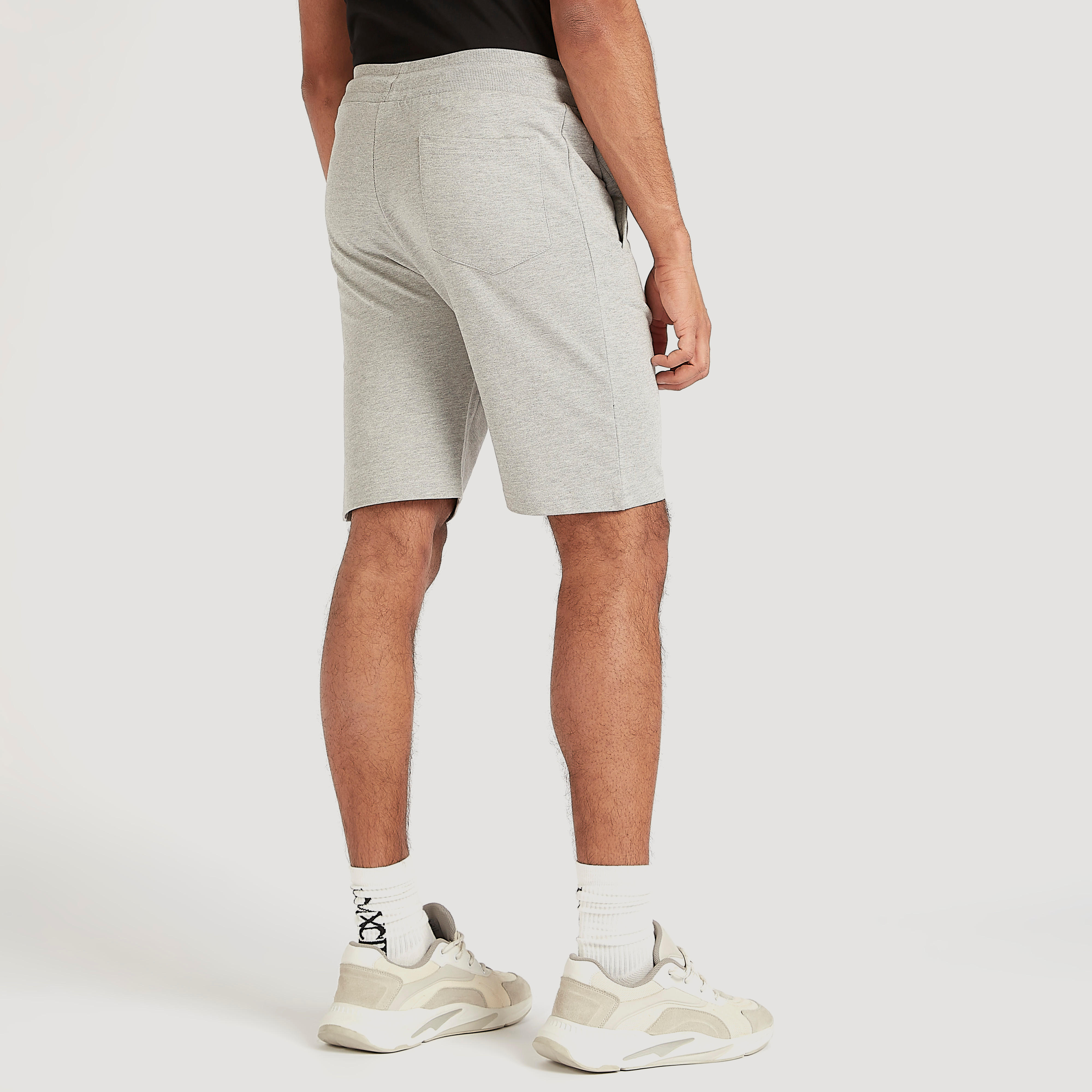 شورت بخصر متوسّط الارتفاع وطبعات شعار باتمان-men-clothing-bottoms-shorts-image-4
