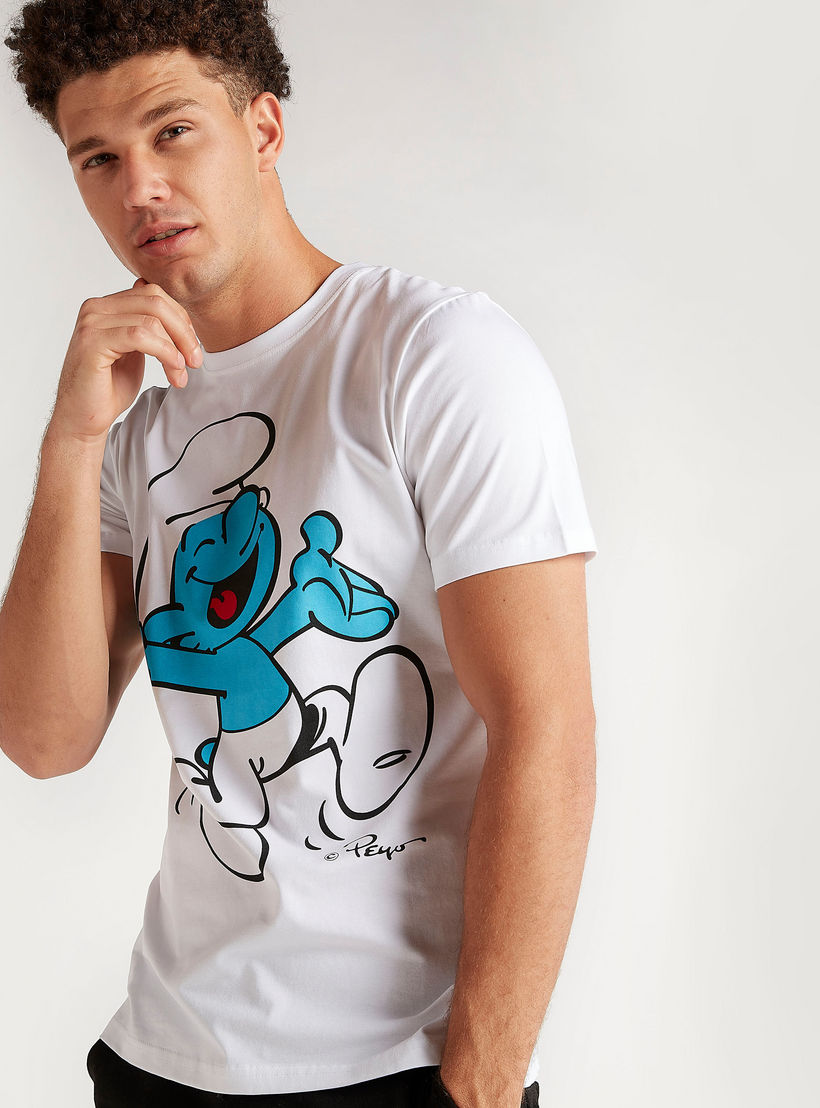 تيشيرت بياقة ضيّقة وأكمام قصيرة وطبعات ذي سمورفز-men-clothing-tshirtsandpolos-tshirts-image-1