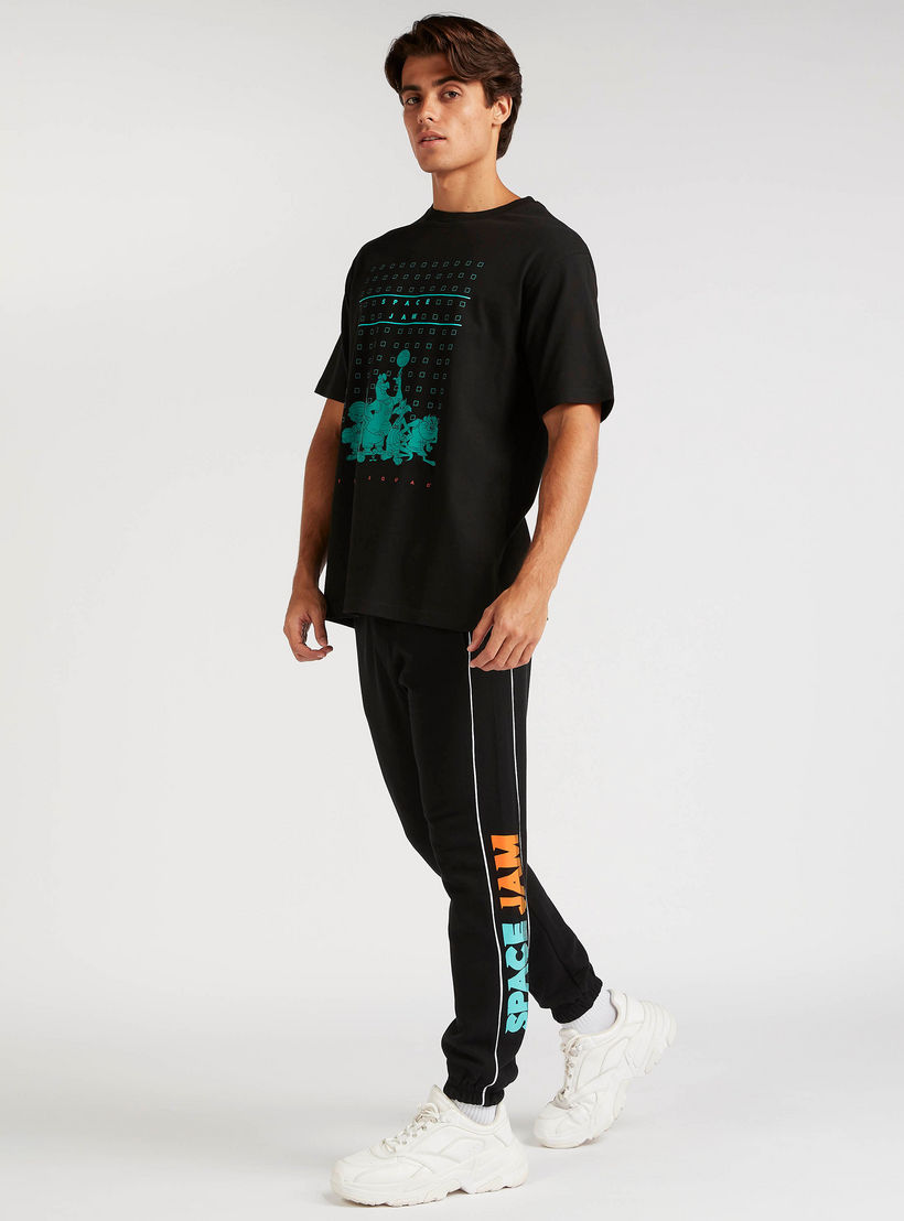 بنطلون رياضي بطبعات جام ورباط إغلاق وجيوب-men-clothing-bottoms-joggers-image-4