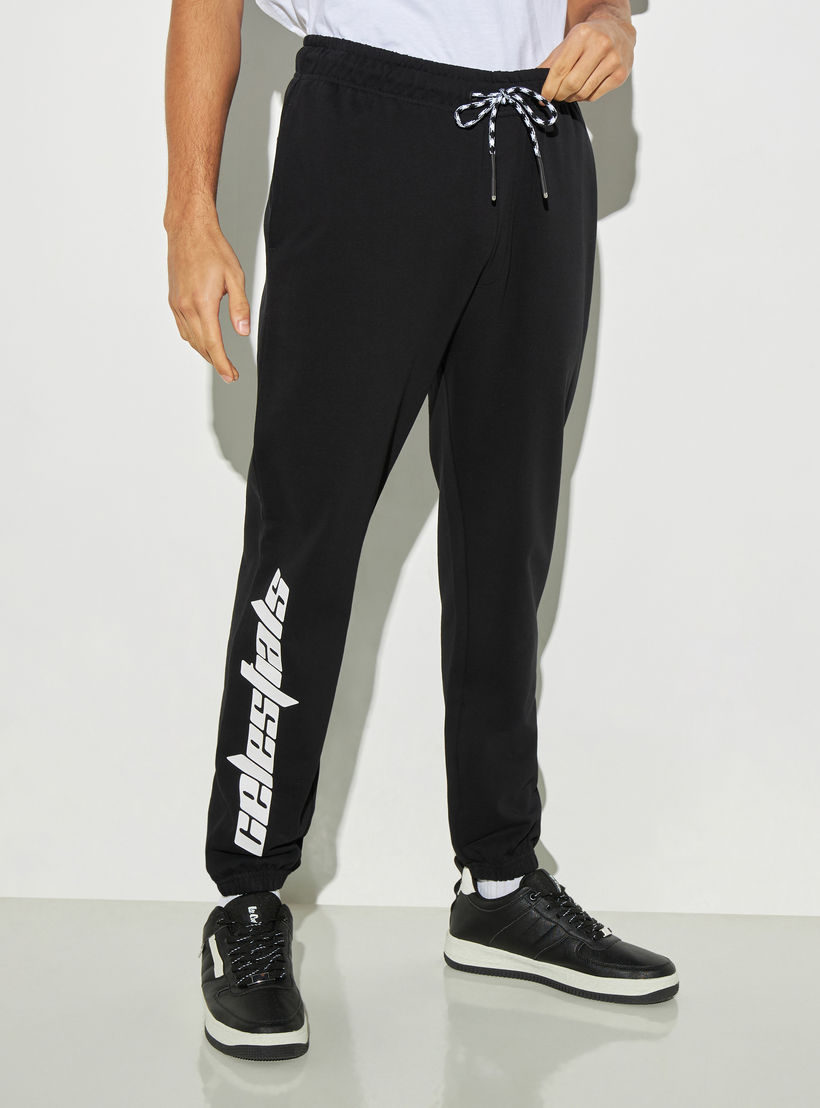 بنطلون رياضي برباط إغلاق وجيوب وطبعات-men-clothing-bottoms-joggers-image-5