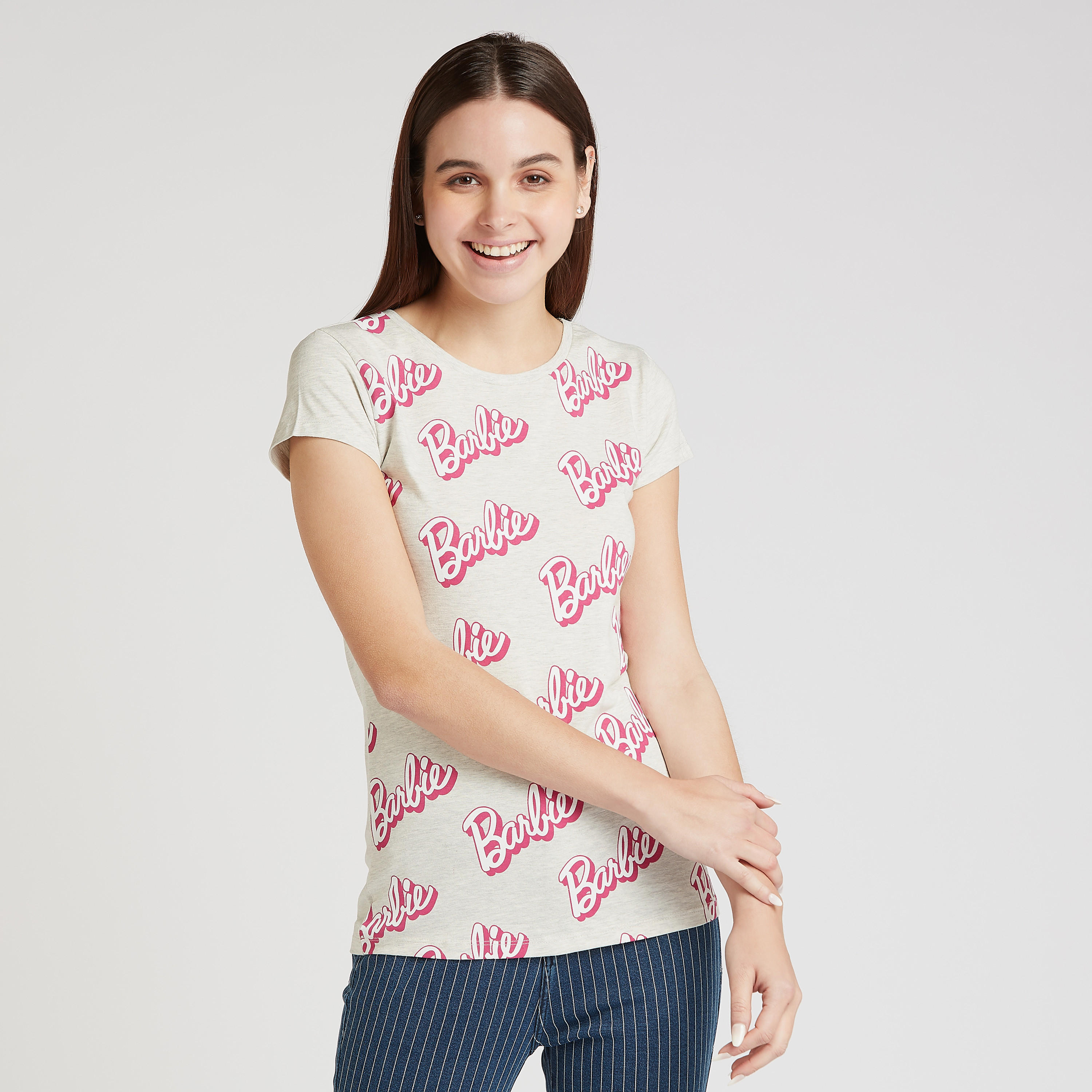 تيشيرت سكيني بياقة مستديرة وأكمام كاب وطبعات باربي-women-clothing-tshirts-image-3