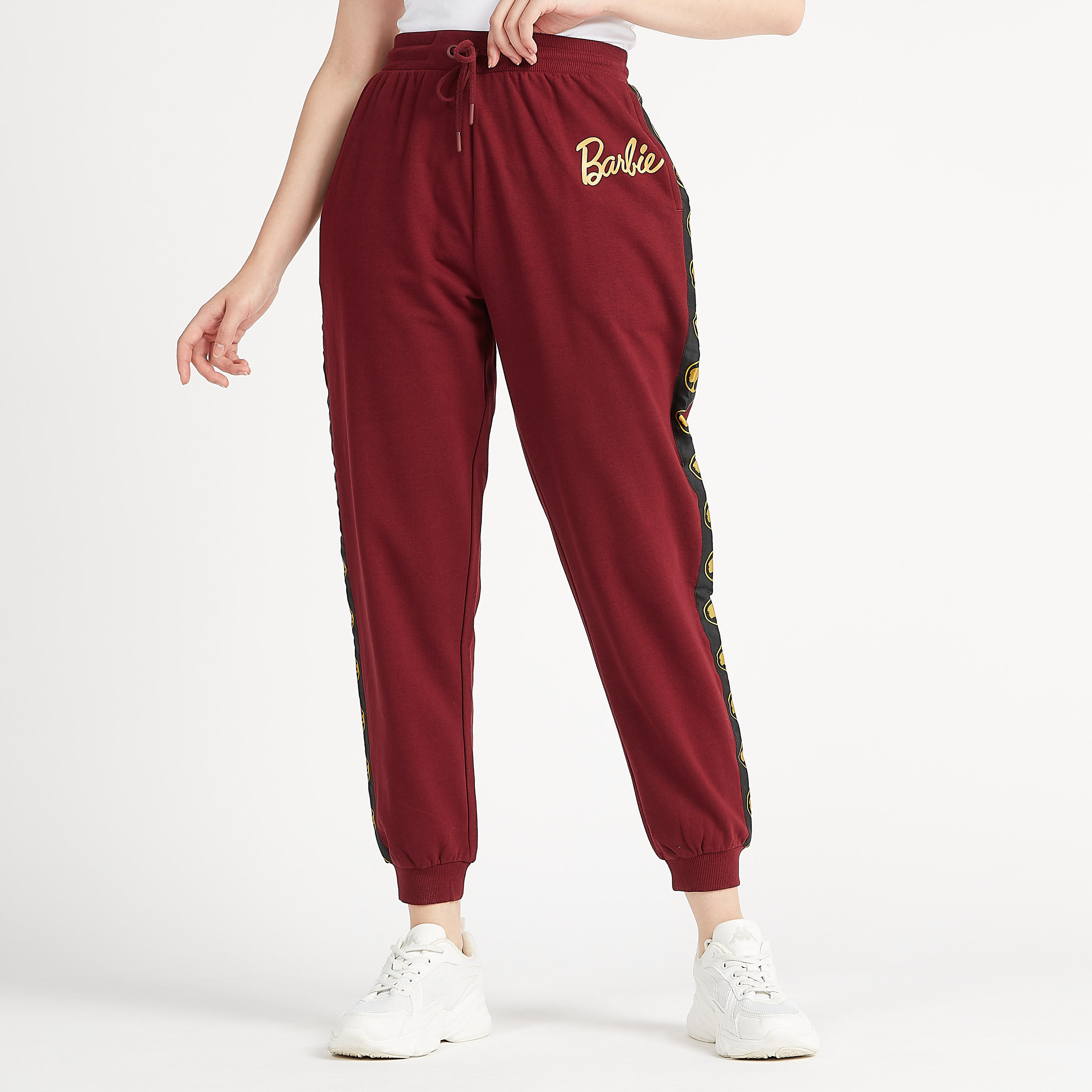 بنطلون رياضي مستدام بقصة مريحة وخصر متوسّط الارتفاع مع تفاصيل شريطة-women-clothing-bottoms-joggers-image-1