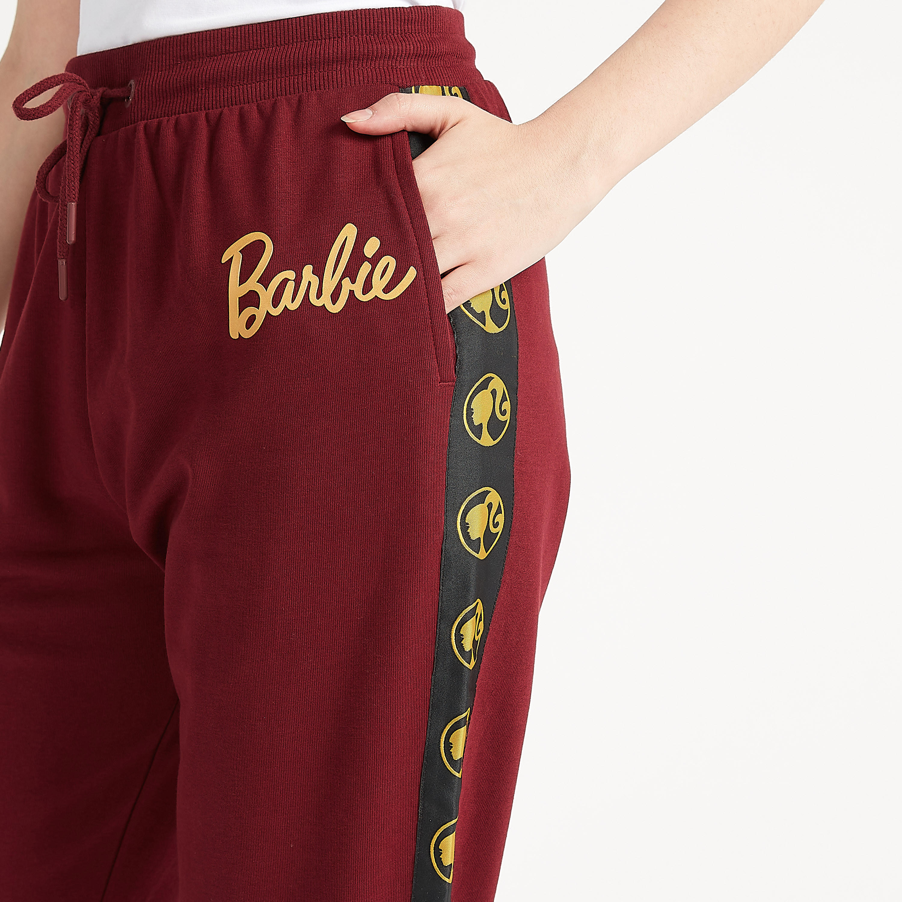 بنطلون رياضي مستدام بقصة مريحة وخصر متوسّط الارتفاع مع تفاصيل شريطة-women-clothing-bottoms-joggers-image-3