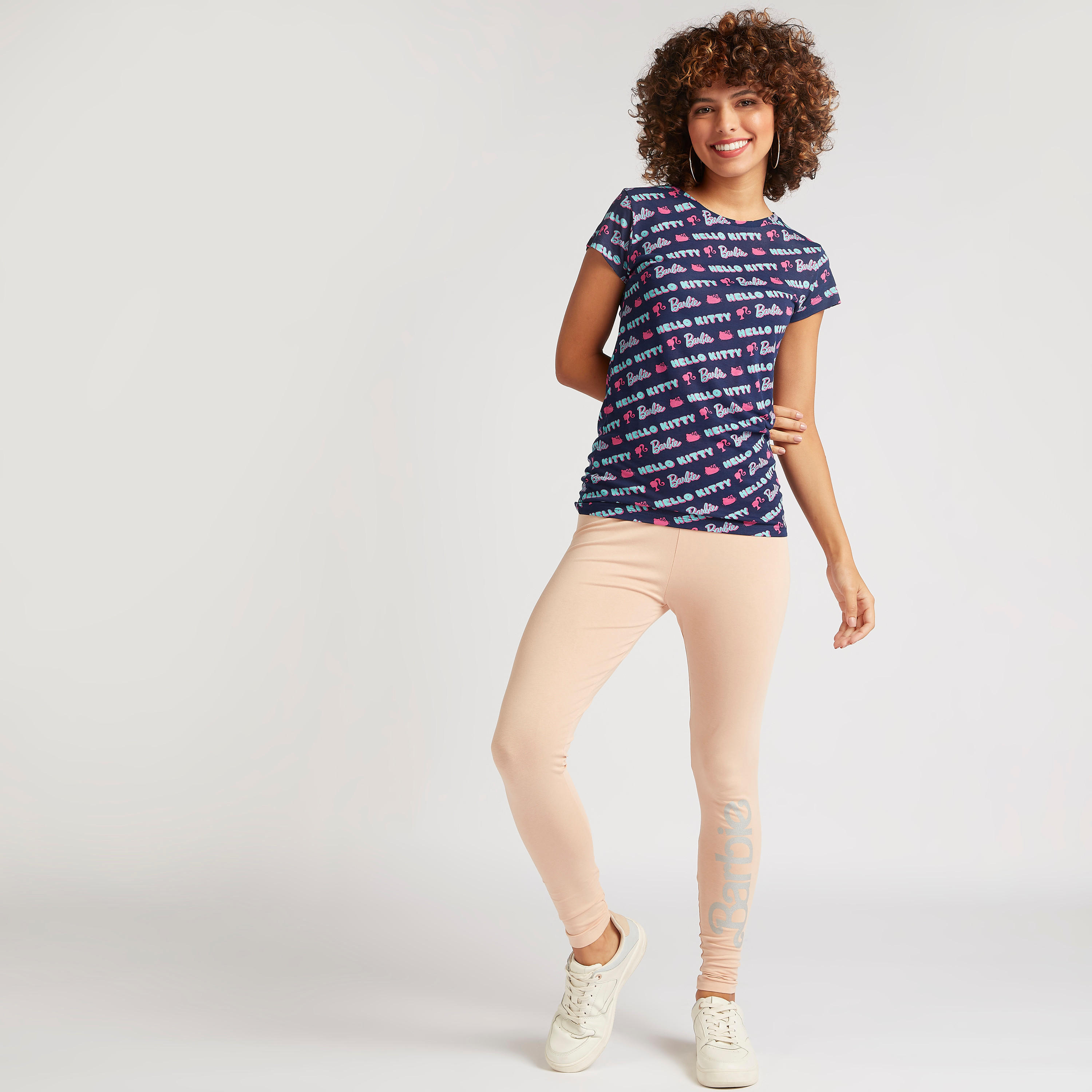 بنطلون ليقنز بخصر مطّاطي متوسط الارتفاع وطبعات بينوتس-women-clothing-bottoms-leggings-image-2