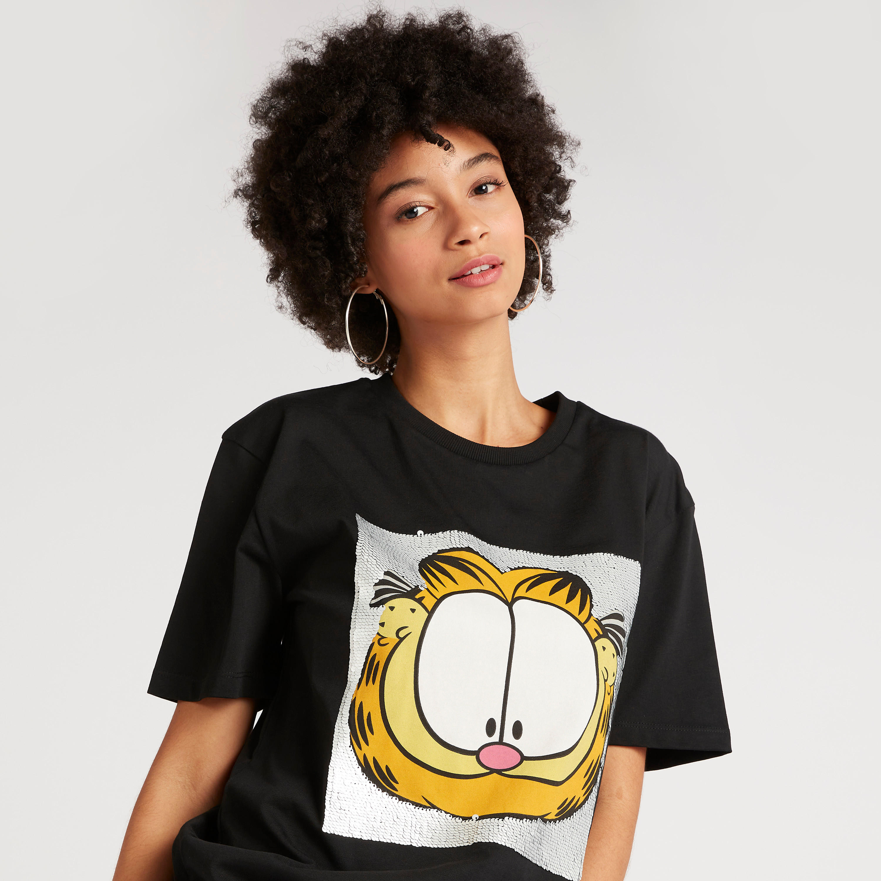تيشيرت بياقة ضيّقة وأكمام كاب وطبعات غارفيد-women-clothing-tshirts-image-1