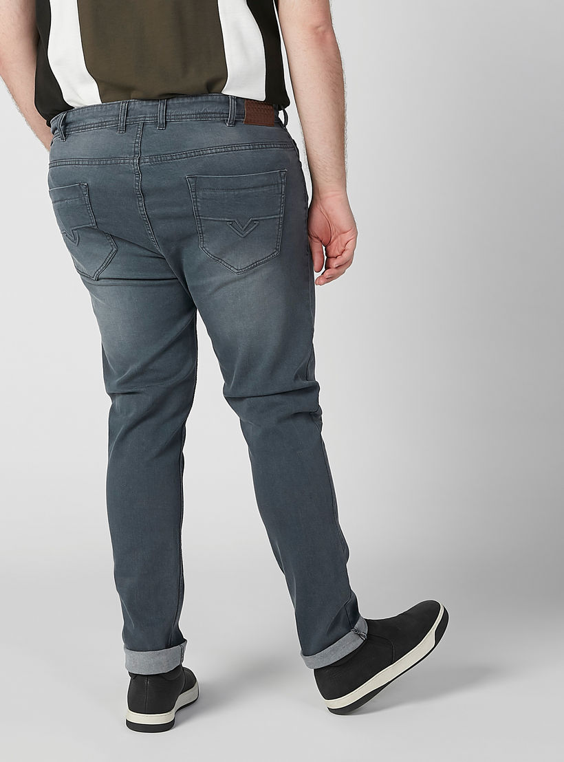 بنطلون جينز سادة بخصر متوسط الارتفاع وجيوب-men-clothing-bottoms-jeans-image-4