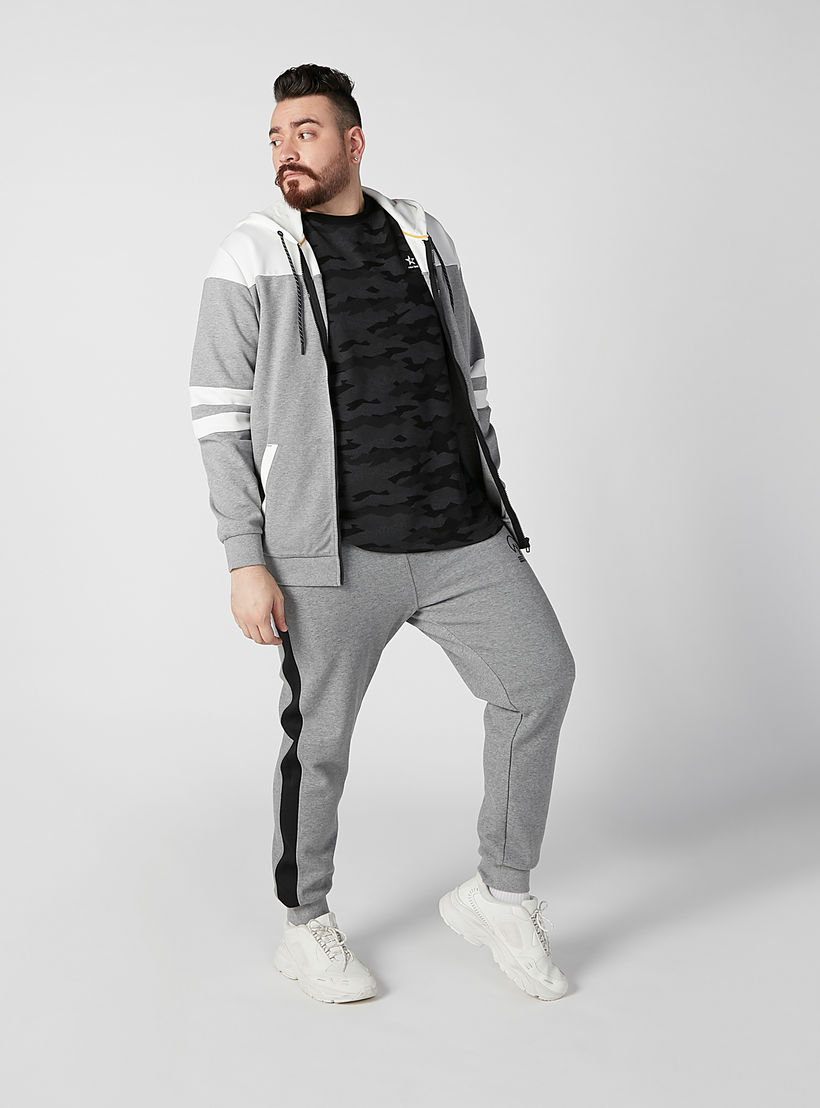بنطلون رياضي سادة بخصر مطّاطي وجيوب-men-clothing-bottoms-joggers-image-2