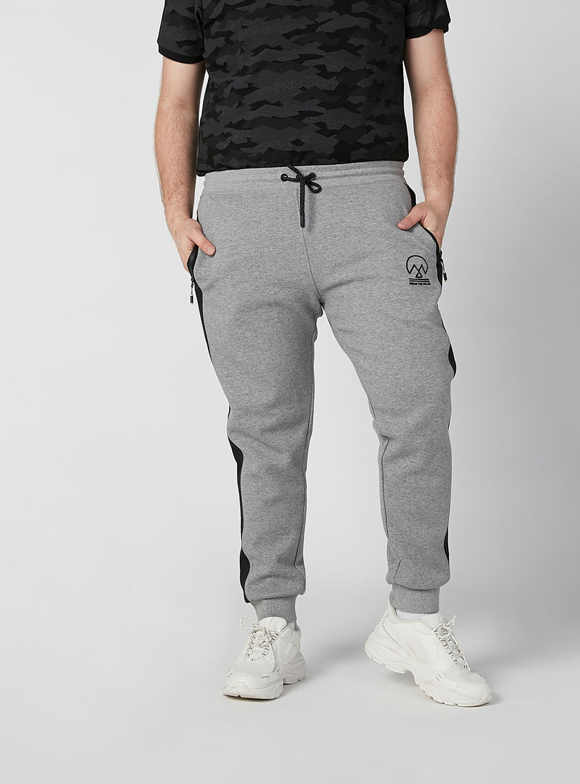 بنطلون رياضي سادة بخصر مطّاطي وجيوب-men-clothing-bottoms-joggers-image-4