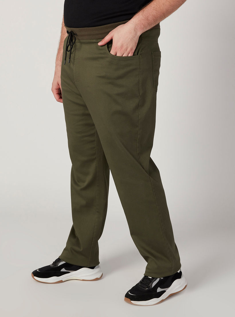 بنطلون سادة بخصر مطّاطي متوسط الارتفاع وجيوب-men-clothing-bottoms-trousersandchinos-trousers-image-5