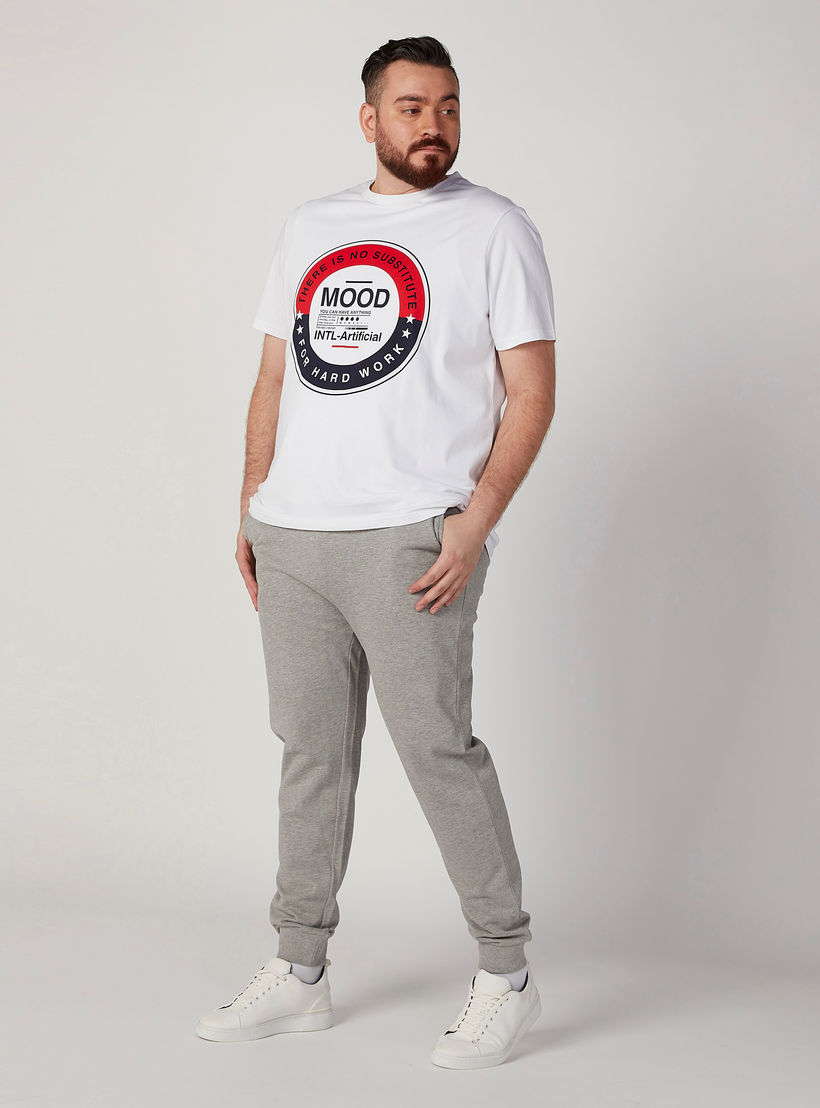 بنطلون رياضي بارز الملمس بخصر متوسط الارتفاع وجيوب-men-clothing-bottoms-joggers-image-2