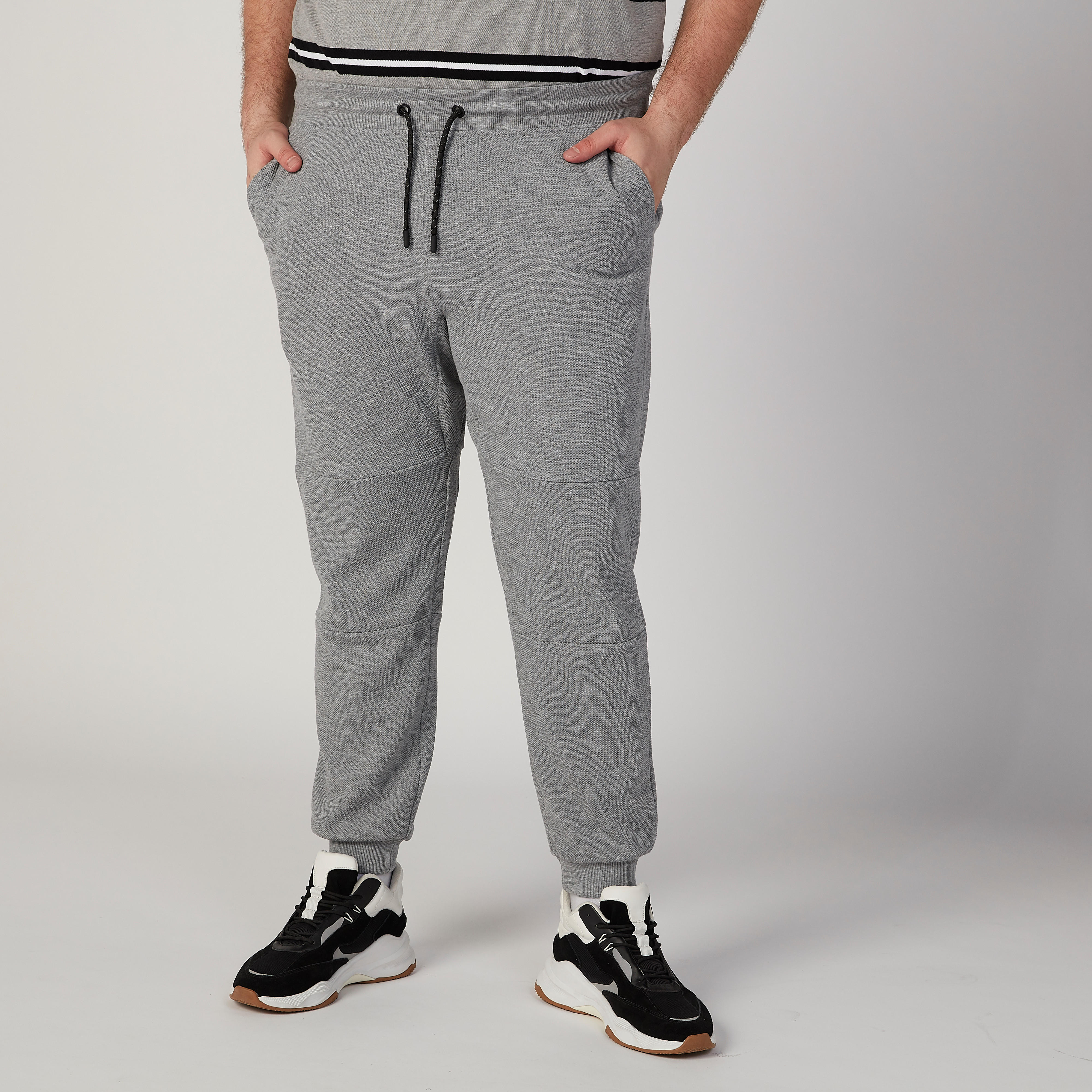 بنطلون رياضي سادة بخصر متوسط الارتفاع وجيوب-men-clothing-bottoms-joggers-image-1