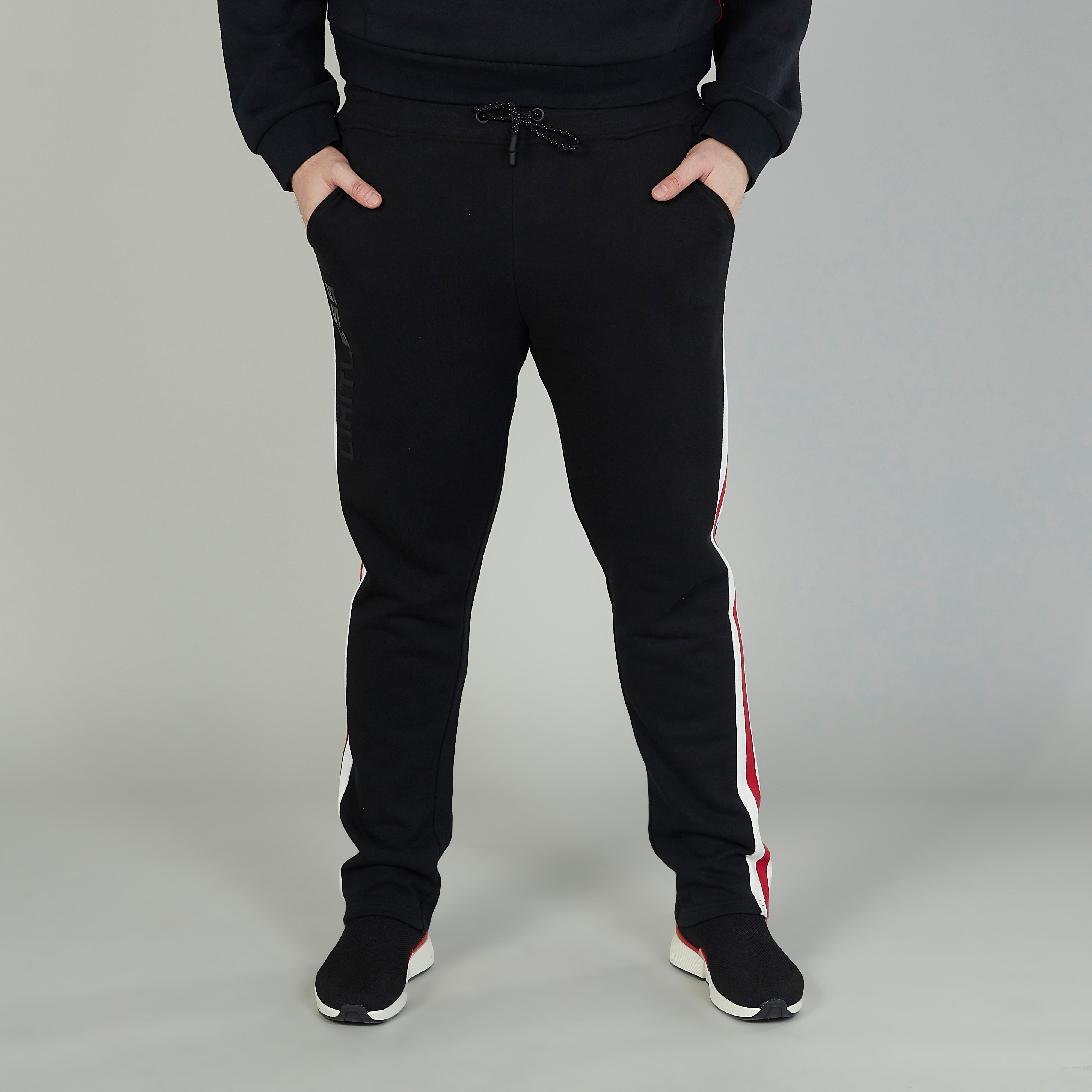 بنطلون رياضي مخطط بخصر مطّاطي متوسط الارتفاع وجيوب-men-clothing-bottoms-joggers-image-1