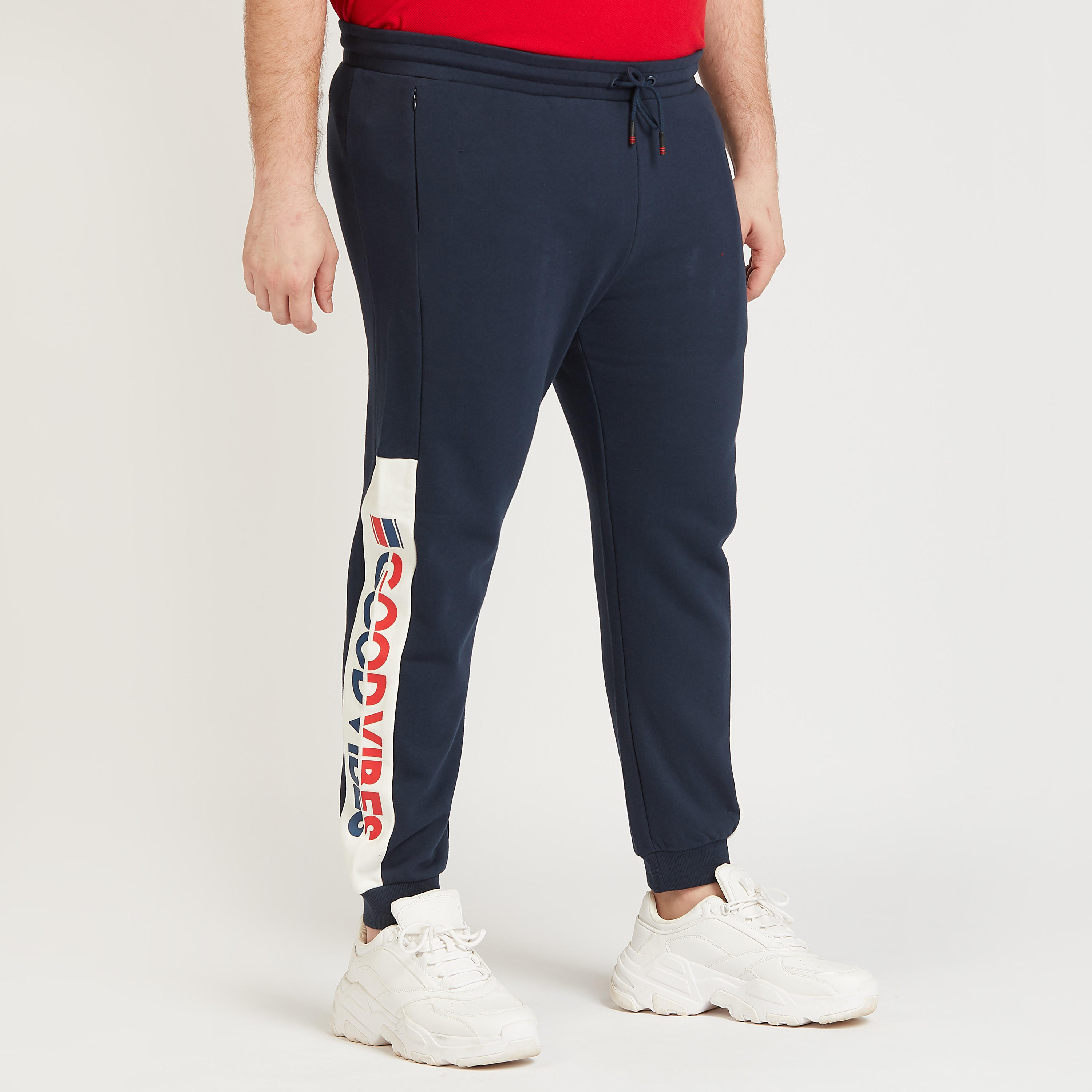 بنطلون رياضي طويل سادة بخصر متوسّط الارتفاع ورباط إغلاق وجيوب-men-clothing-bottoms-joggers-image-5
