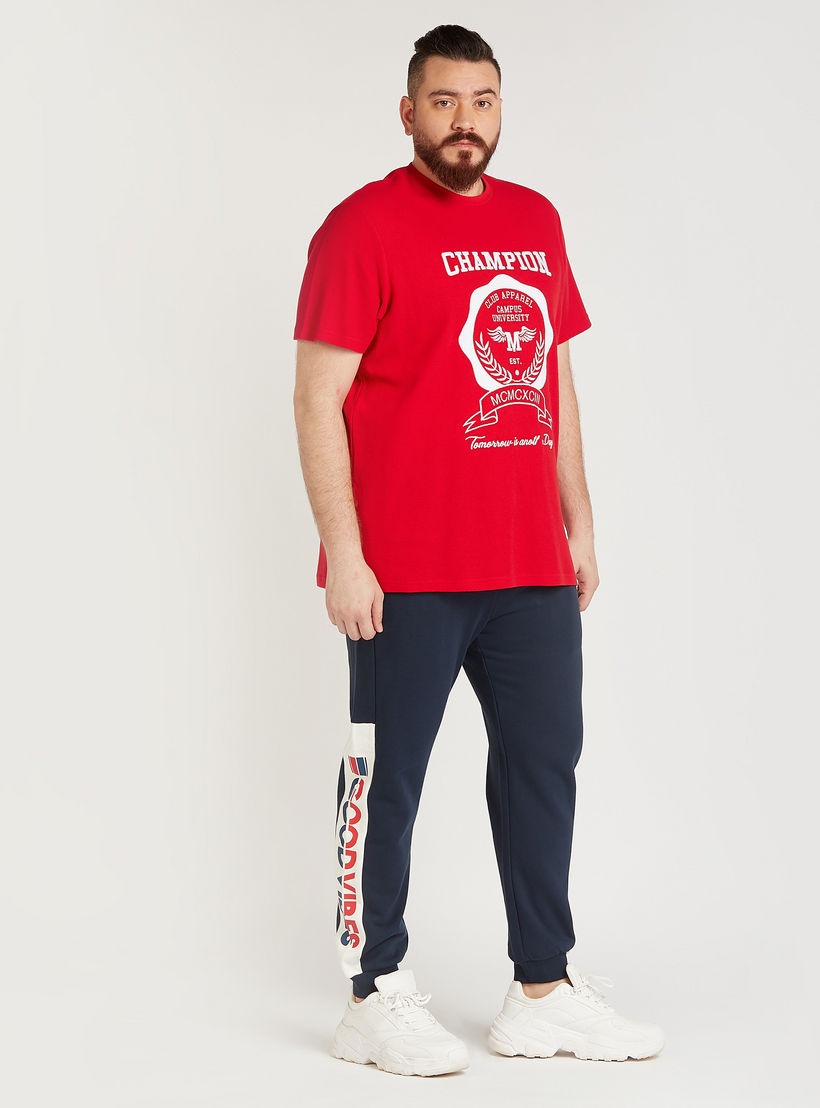 بنطلون رياضي طويل سادة بخصر متوسّط الارتفاع ورباط إغلاق وجيوب-men-clothing-bottoms-joggers-image-4
