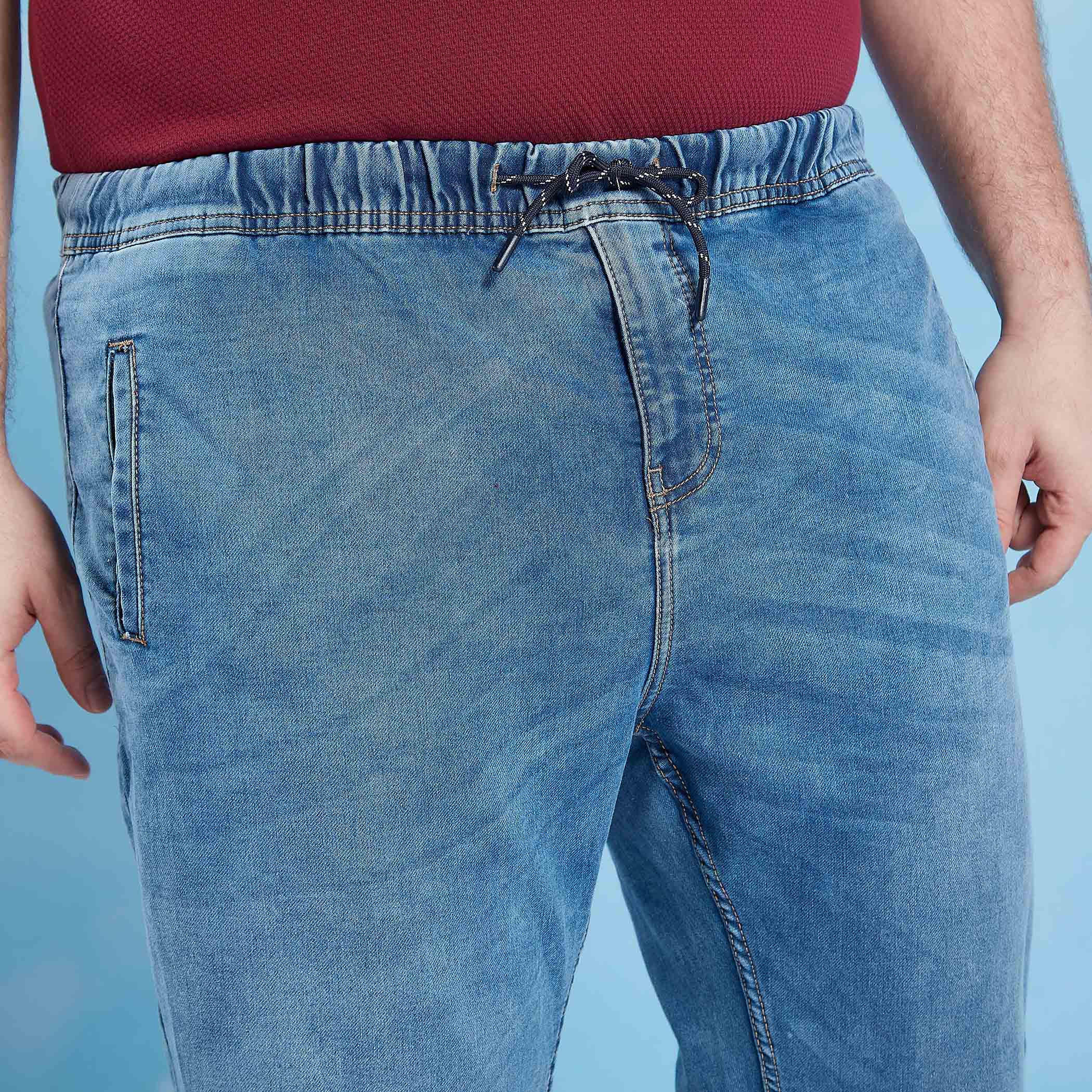 بنطلون جينز سادة بجيوب وخصر مطّاطي متوسّط الإرتفاع-men-clothing-bottoms-jeans-image-3