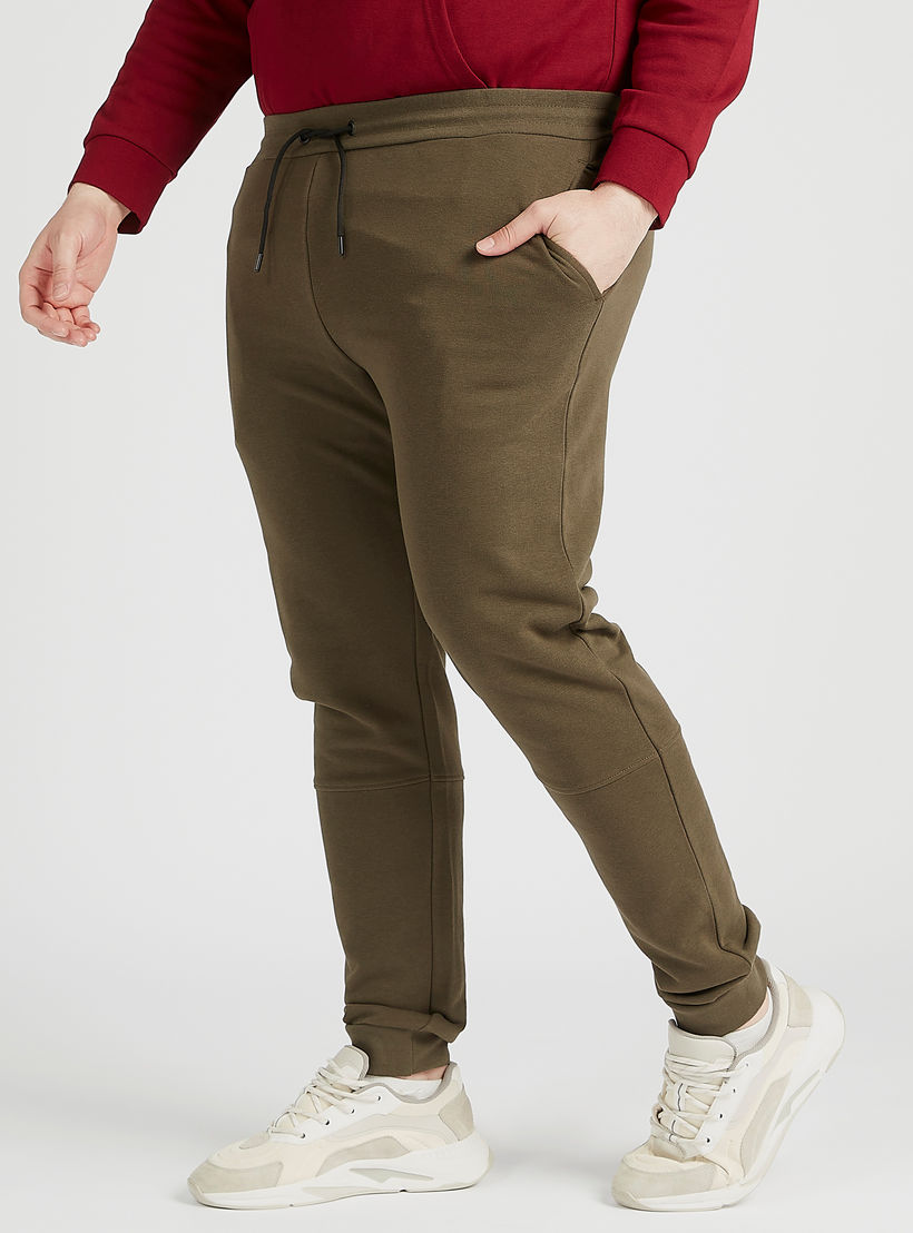 بنطلون رياضي سادة بخصرمتوسط الارتفاع و رباط إغلاق-men-clothing-bottoms-joggers-image-4