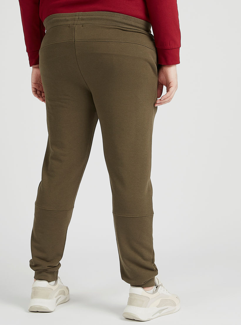 بنطلون رياضي سادة بخصرمتوسط الارتفاع و رباط إغلاق-men-clothing-bottoms-joggers-image-2