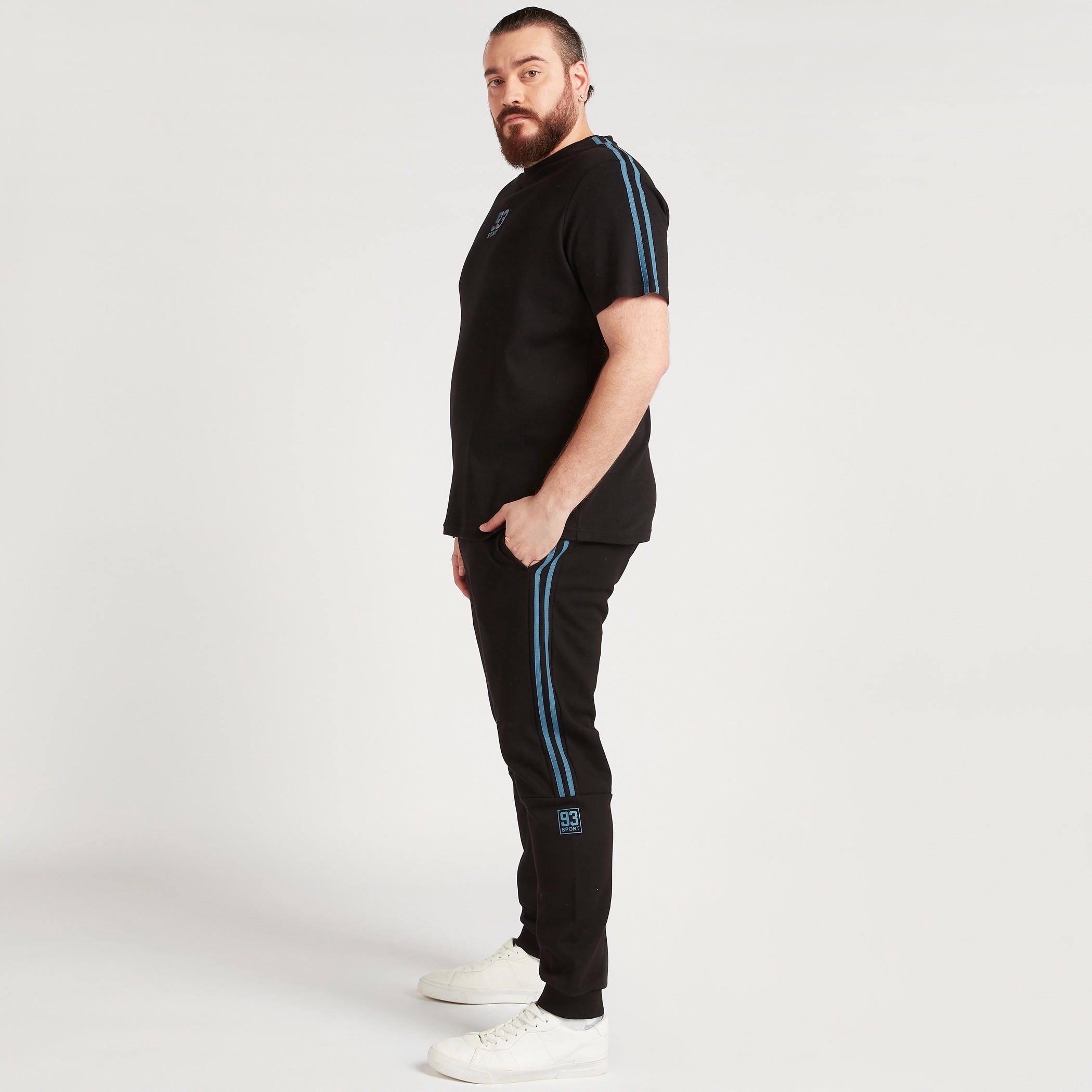 بنطلون رياضي سادة بخصر متوسّط الارتفاع ورباط إغلاق-men-clothing-bottoms-joggers-image-4