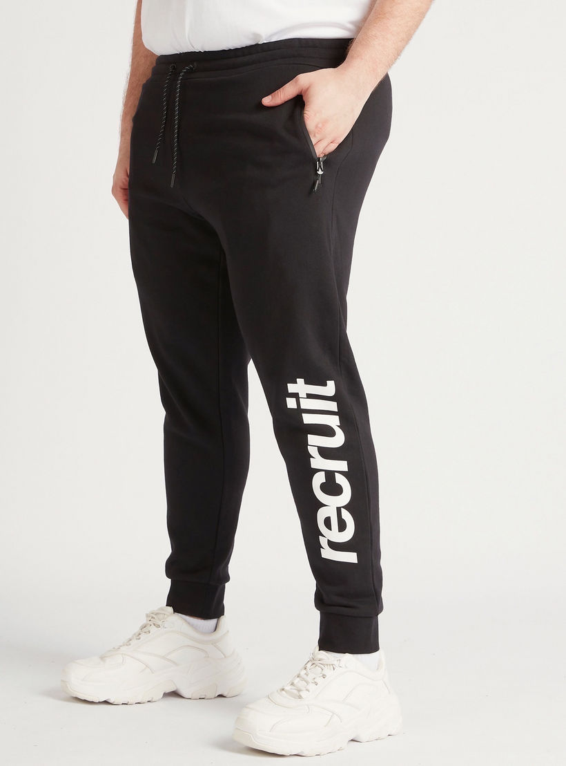 بنطلون رياضي برباط إغلاق وجيوب وطبعات-men-clothing-bottoms-joggers-image-4