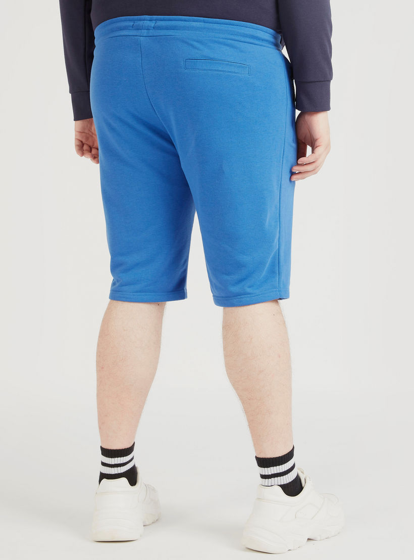شورت سادة برباط إغلاق وخصر متوسّط الارتفاع-men-clothing-bottoms-shorts-image-1