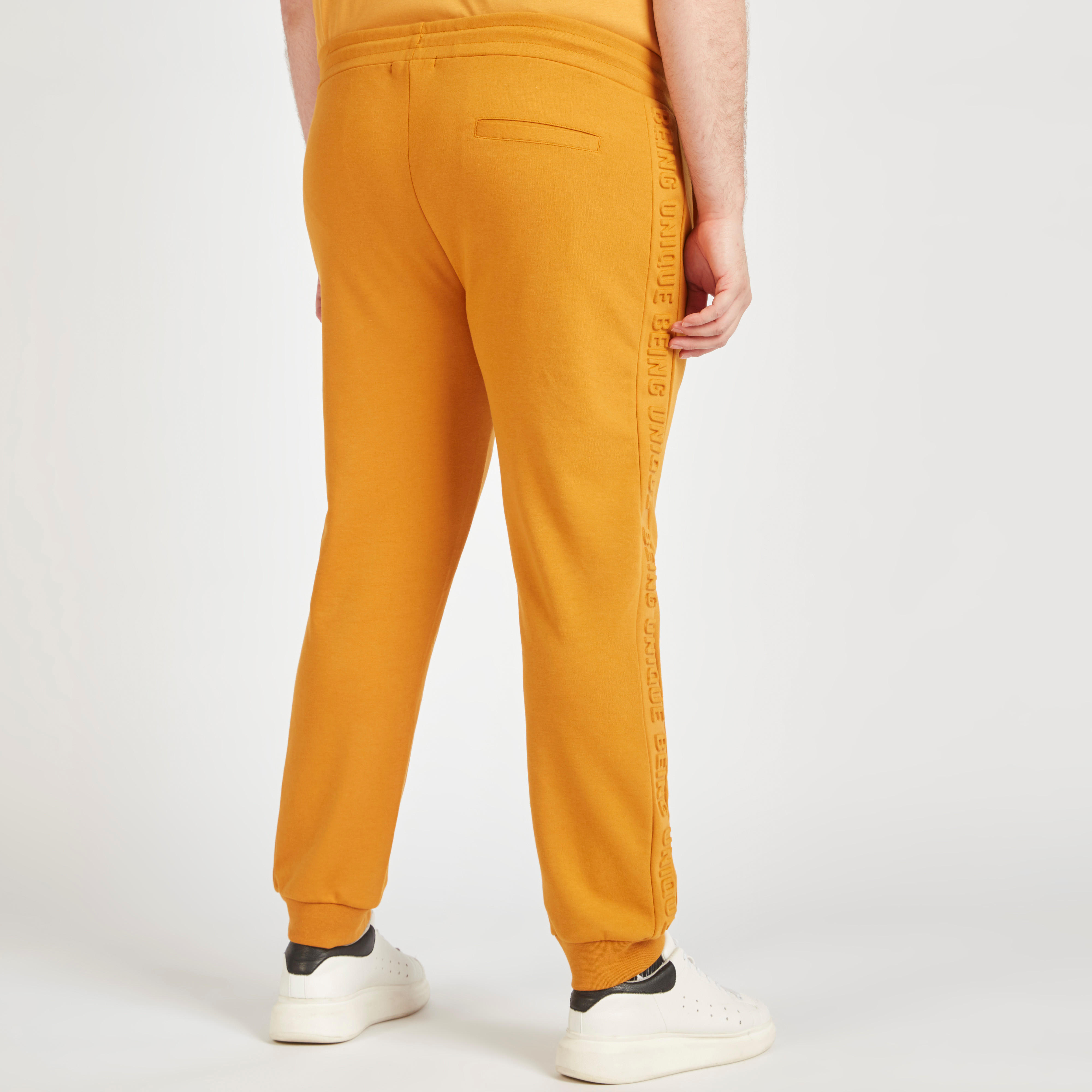 Text Embossed Mid-Rise Joggers with Drawstring Closure-men-clothing-bottoms-joggers-image-9