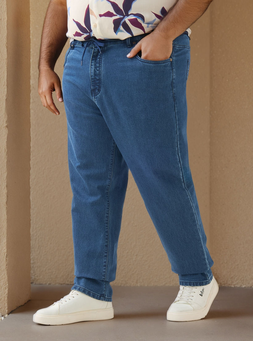 بنطلون جينز مقاس كبير بقصّة مريحة وخصر مطاطي وجيوب-men-clothing-bottoms-jeans-image-5