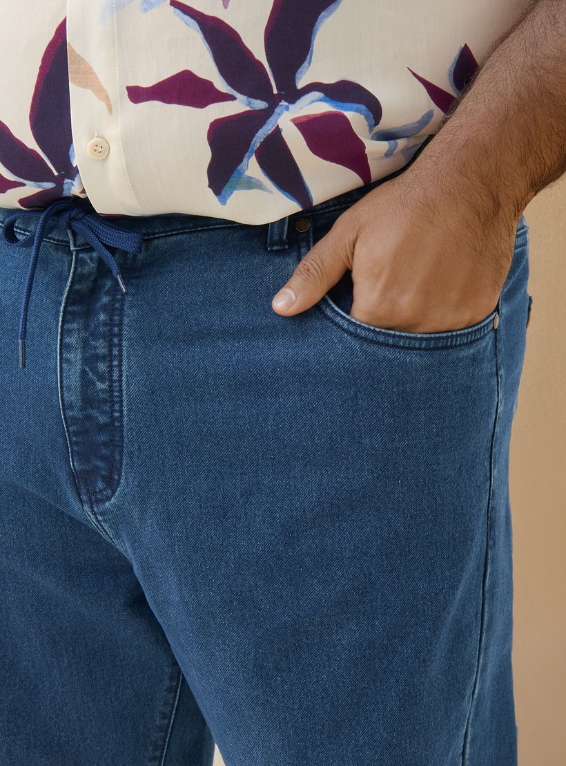 بنطلون جينز مقاس كبير بقصّة مريحة وخصر مطاطي وجيوب-men-clothing-bottoms-jeans-image-7