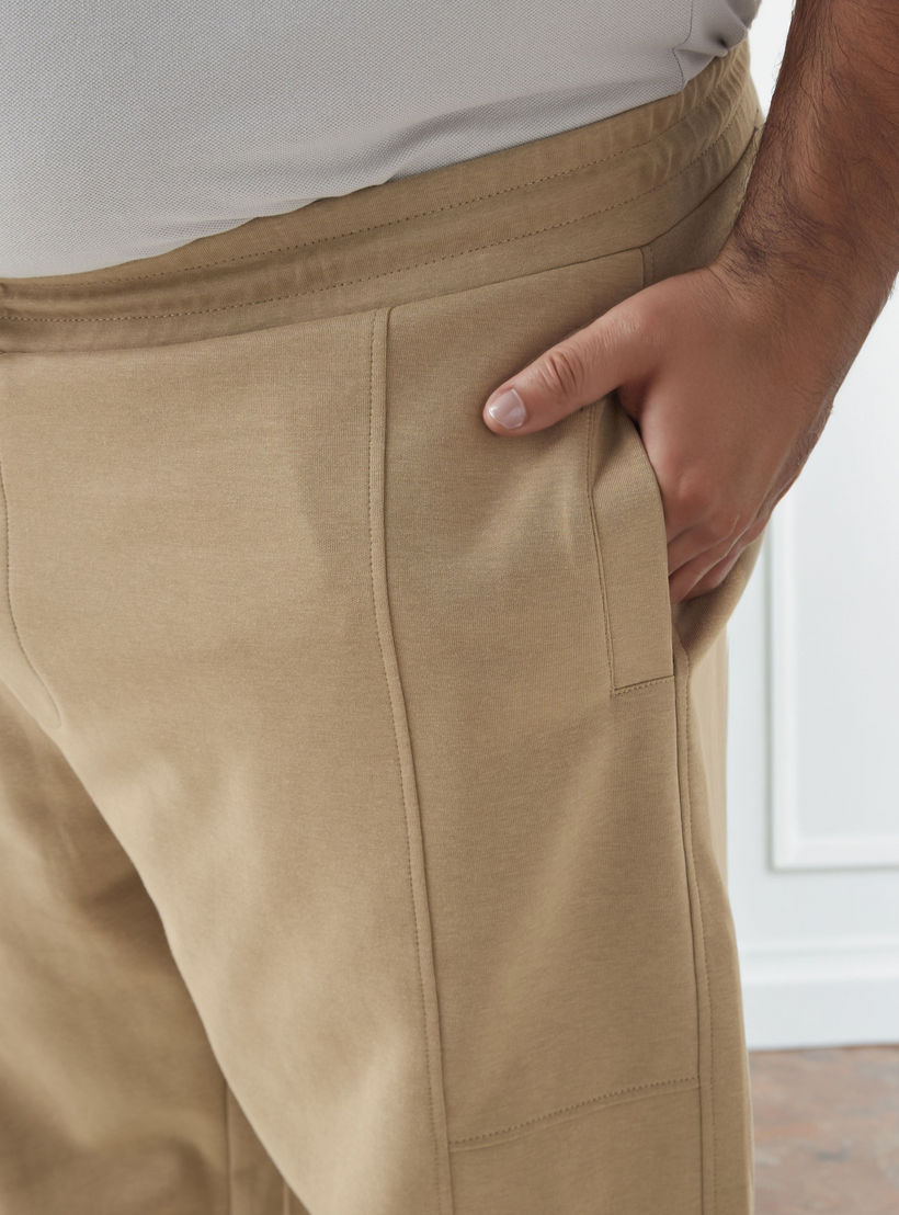 بنطلون رياضي رجالي بقصّة عادية وخصر مطاطي وجيوب-men-clothing-bottoms-joggers-image-4