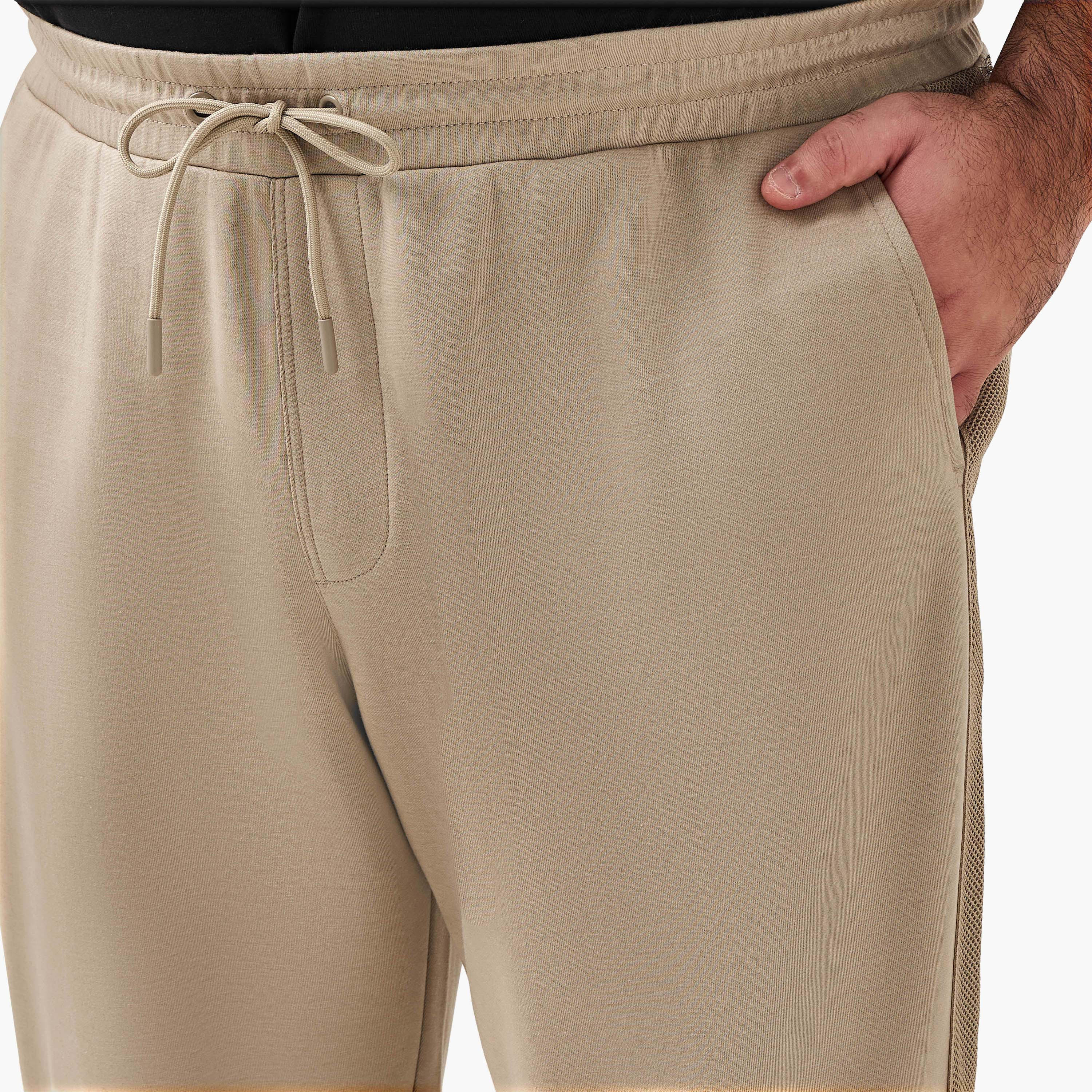 بنطلون رياضي بقصة عادية وجيوب للرجال-men-clothing-bottoms-joggers-image-1