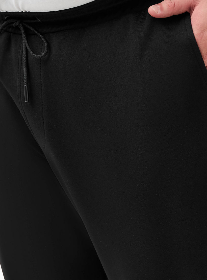 بنطلون رياضي بقصة عادية وجيوب للرجال-men-clothing-bottoms-joggers-image-1